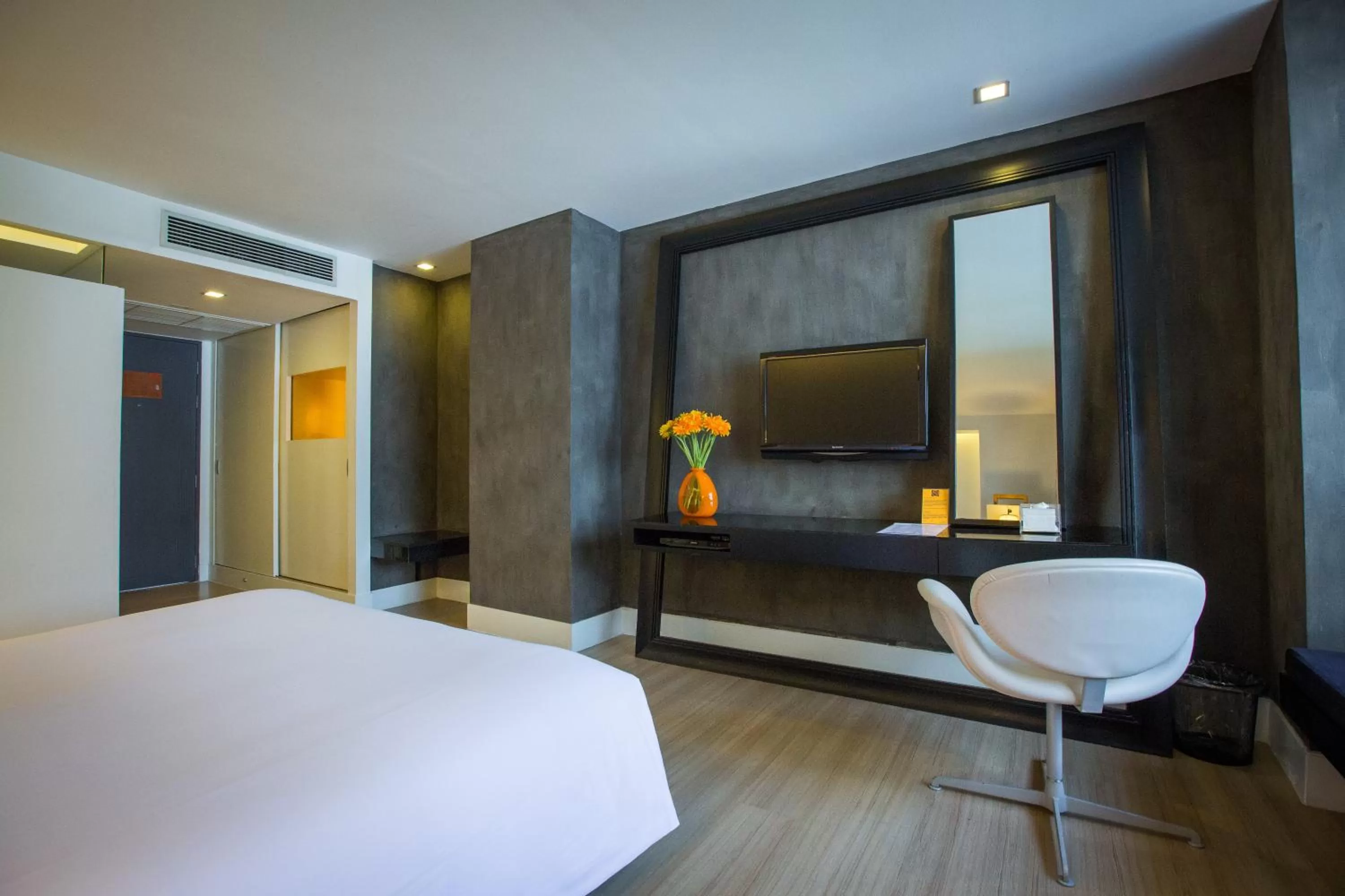 Seating area, Bed in Trinity Silom Hotel