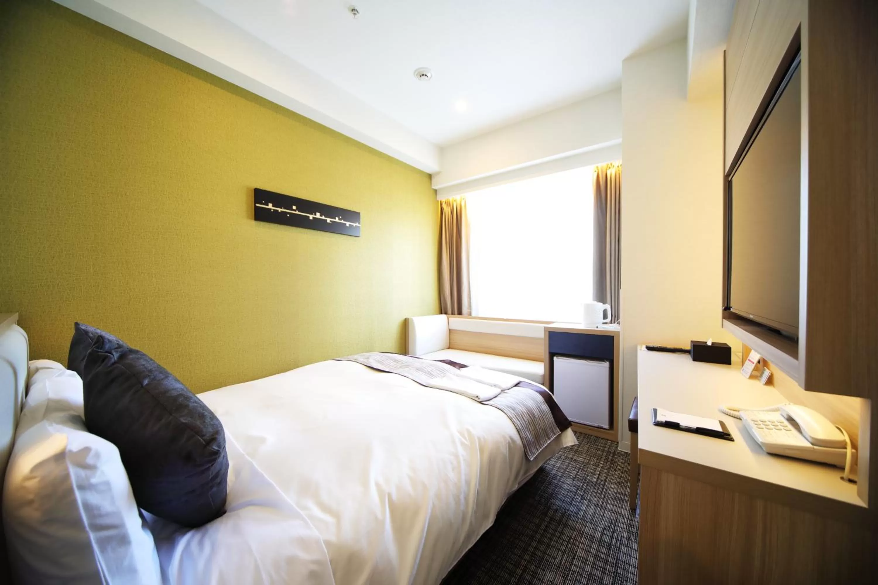 Bed in Hotel Sunroute Asakusa