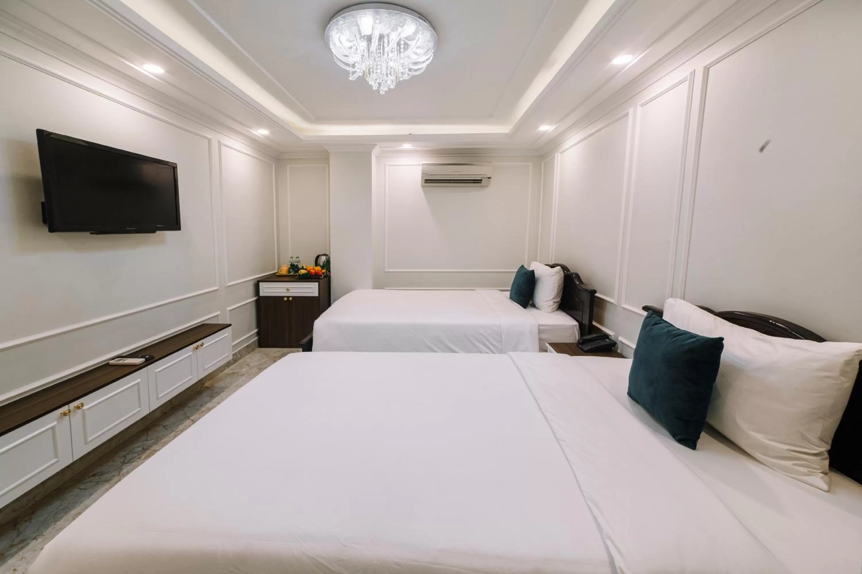 Photo of the whole room, Bed in Saigon Hanoi Central Hotel