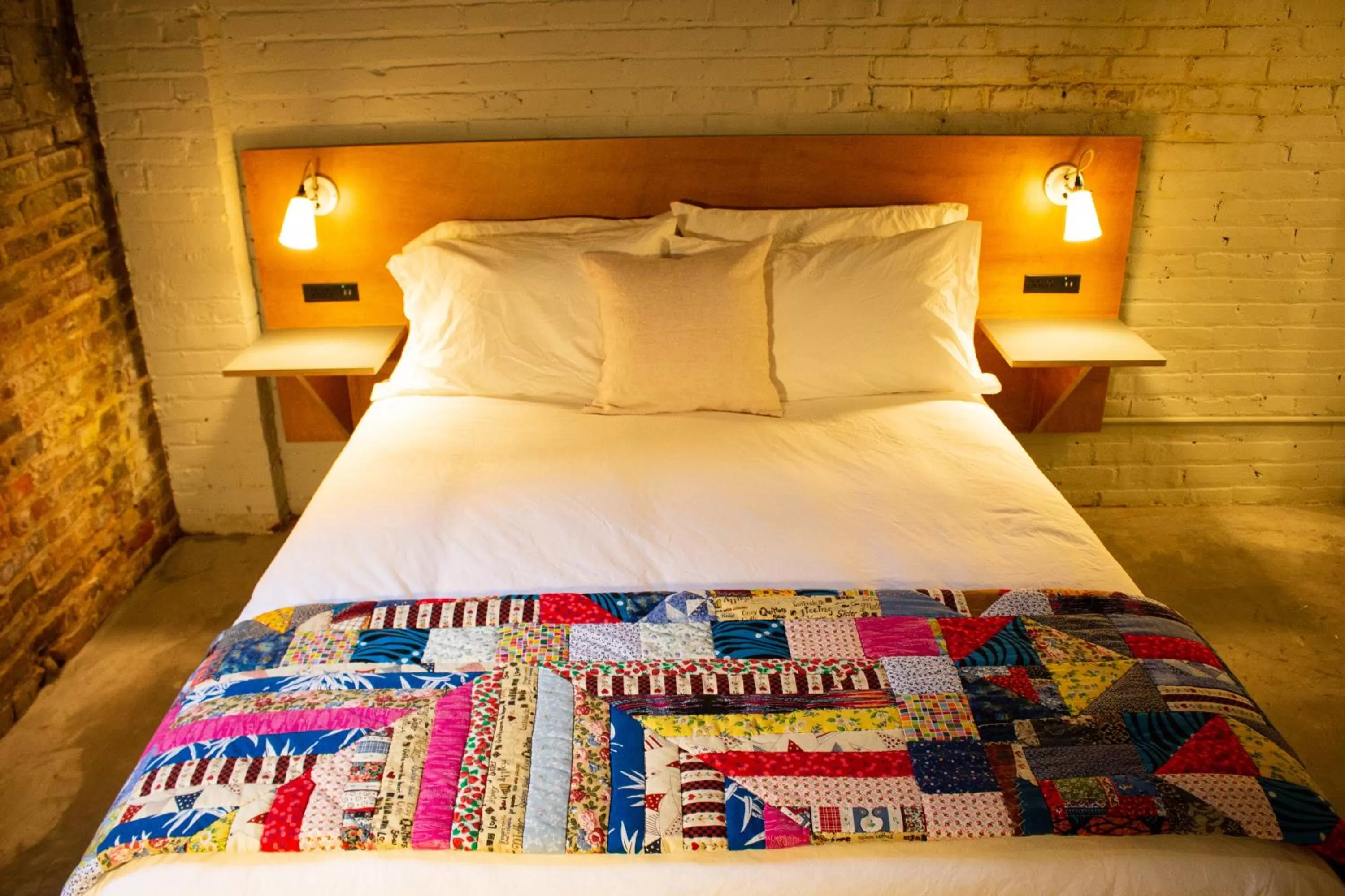 Bed in Travelers Hotel