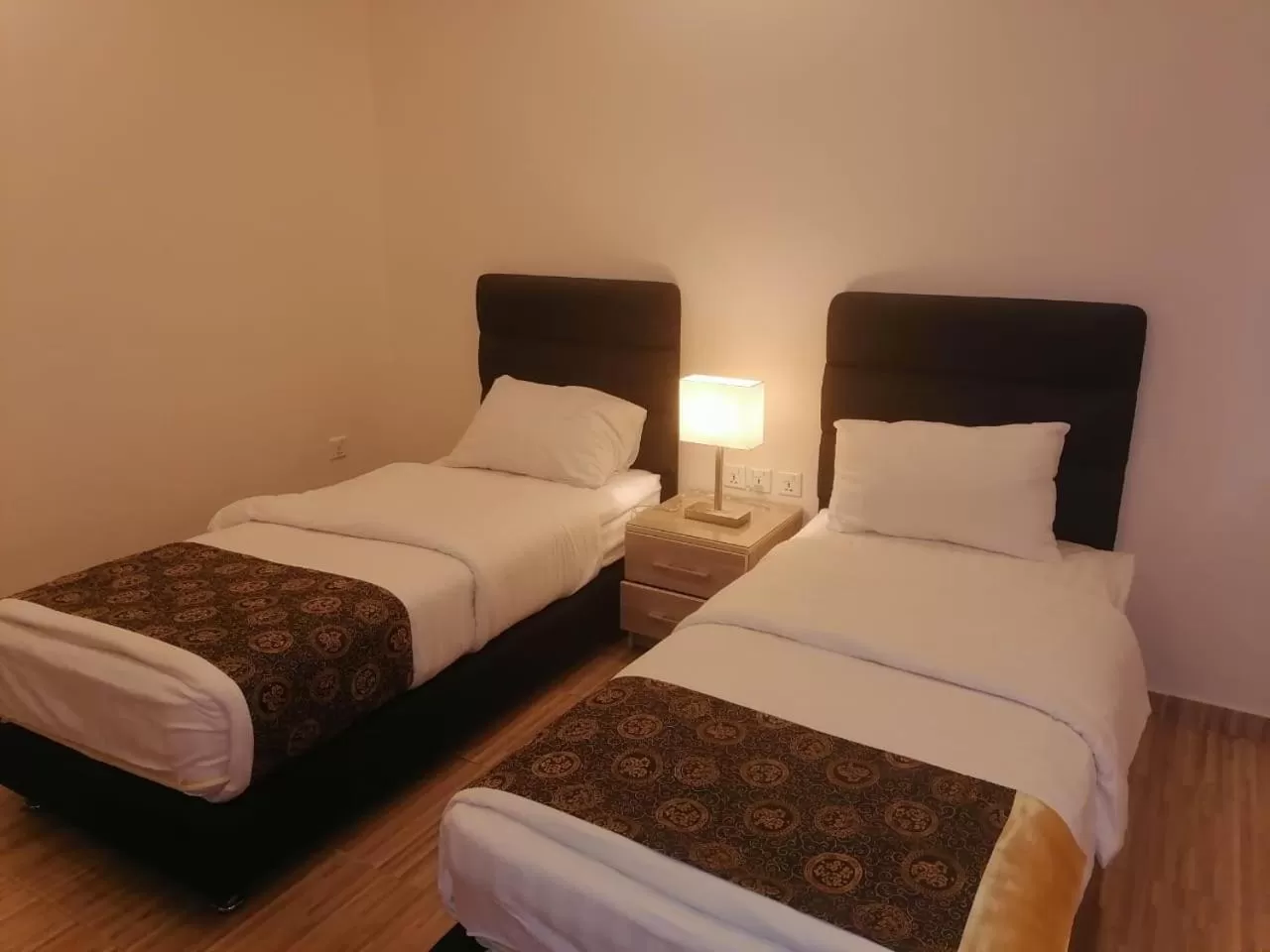 Bed in Al-Ahlam Hotel Apartments