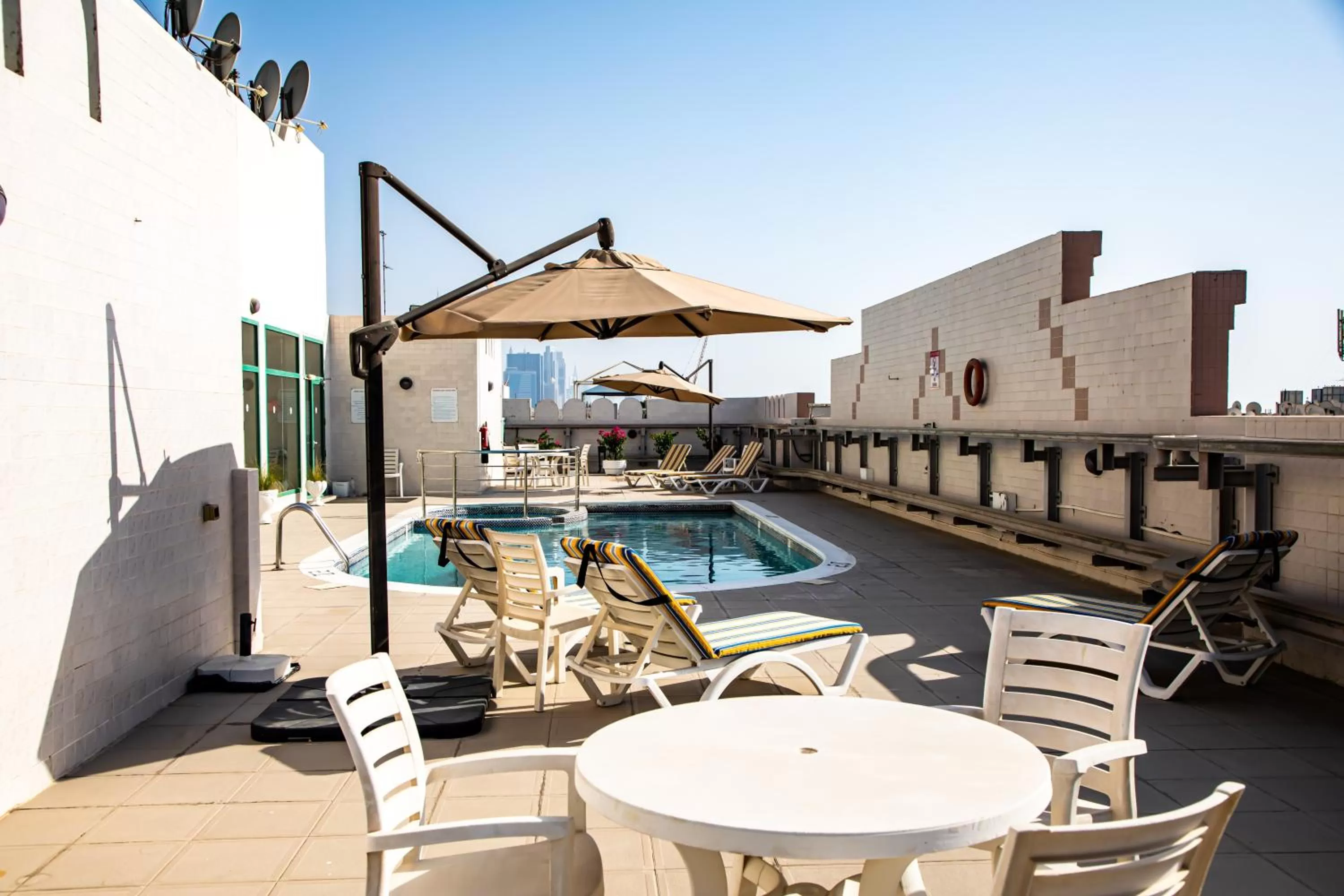 Swimming pool in West Zone Pearl Hotel Apartment