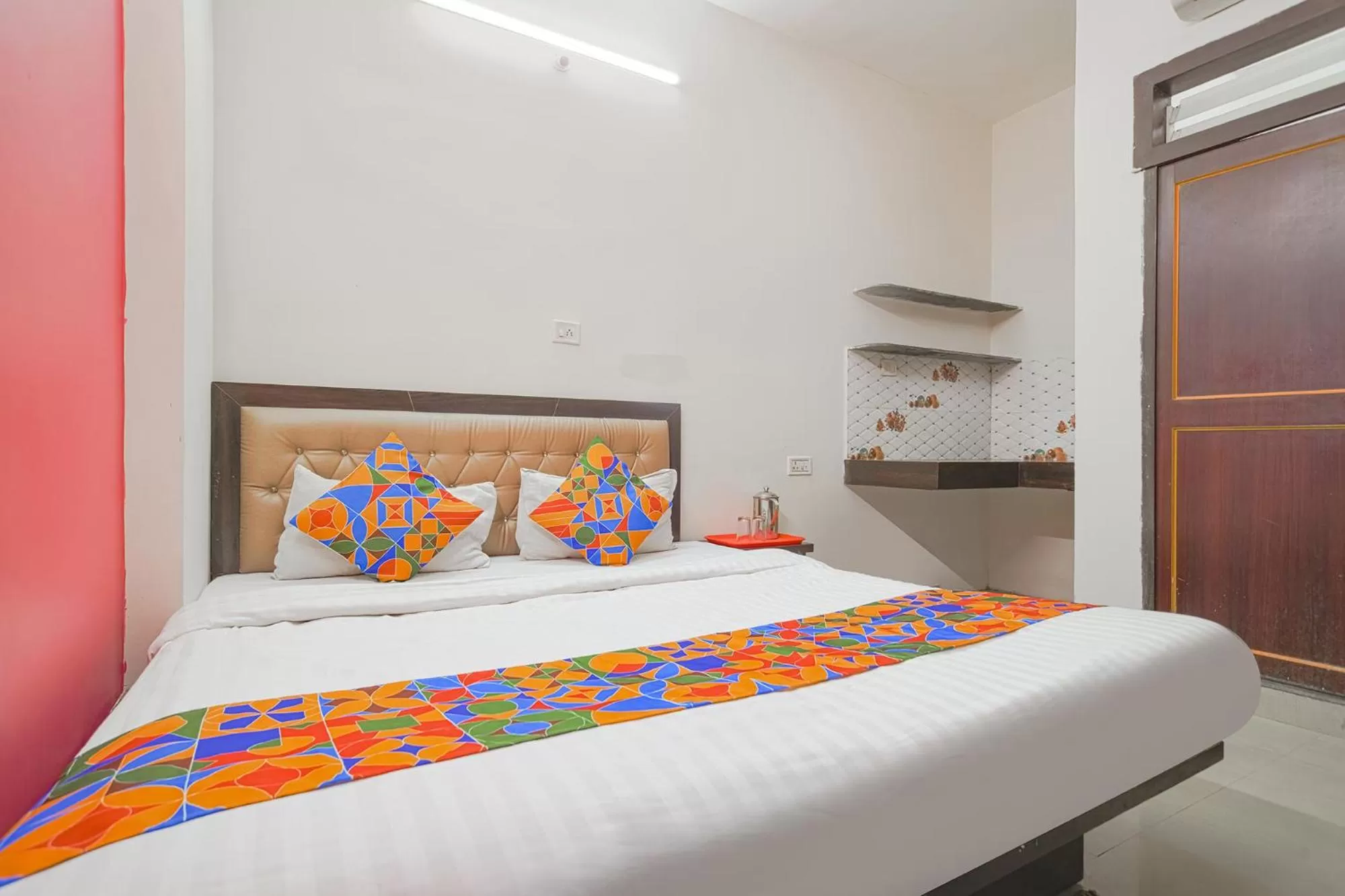 Bed in FabExpress Royal Palace Inn