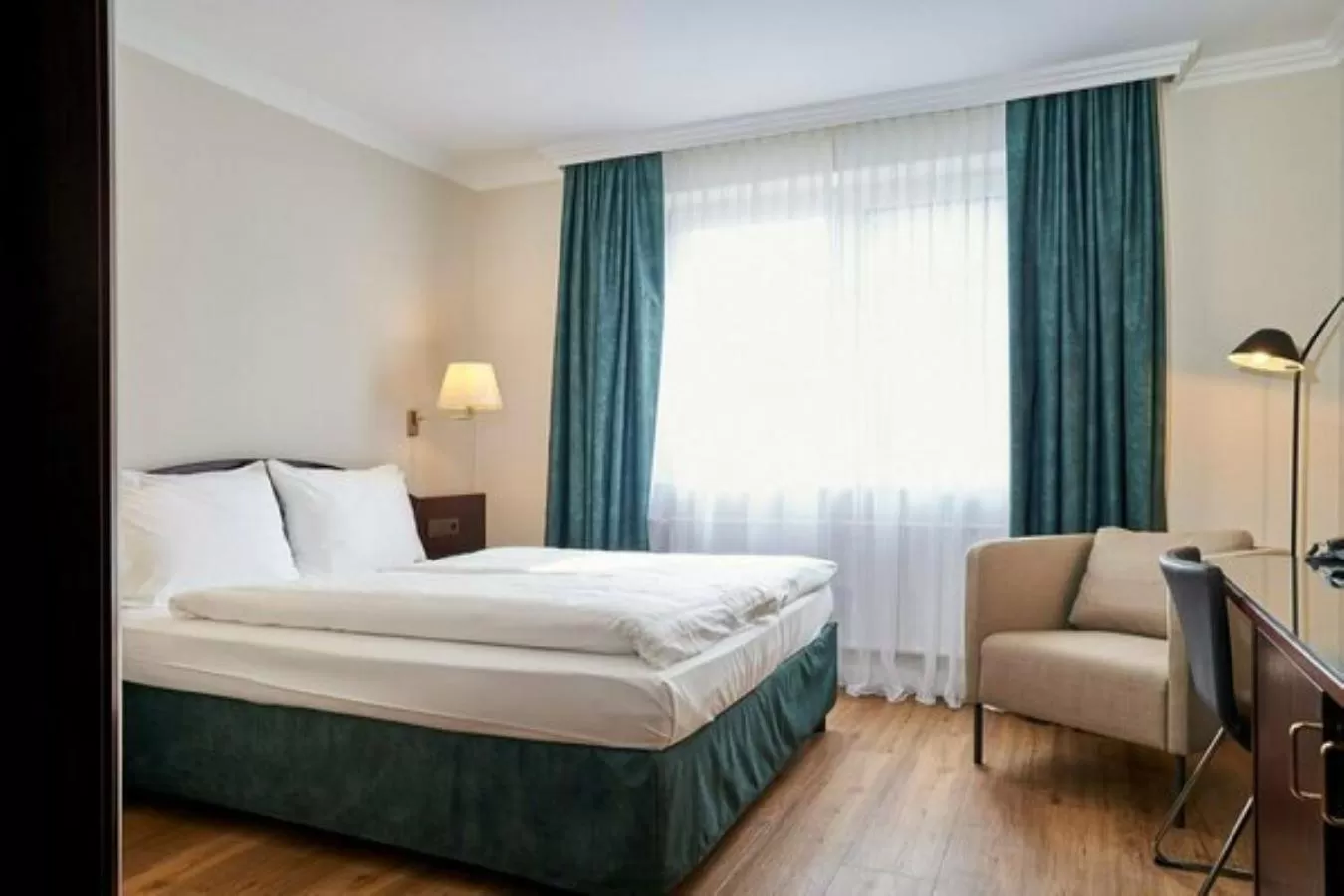 Photo of the whole room, Bed in Hotel Wilhelm Busch