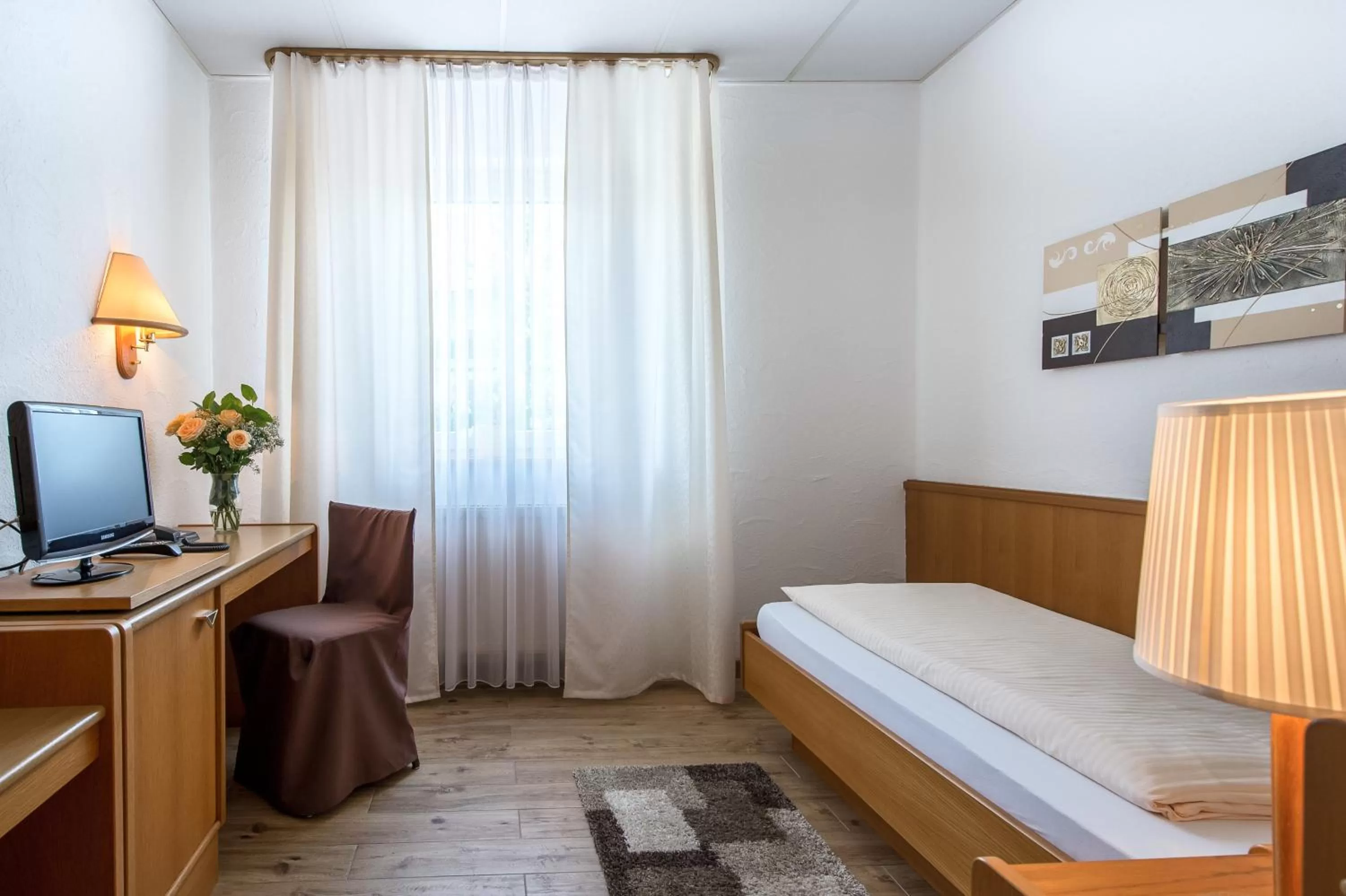 Decorative detail, Bed in Hotel-Restaurant Schwyzerhüsli