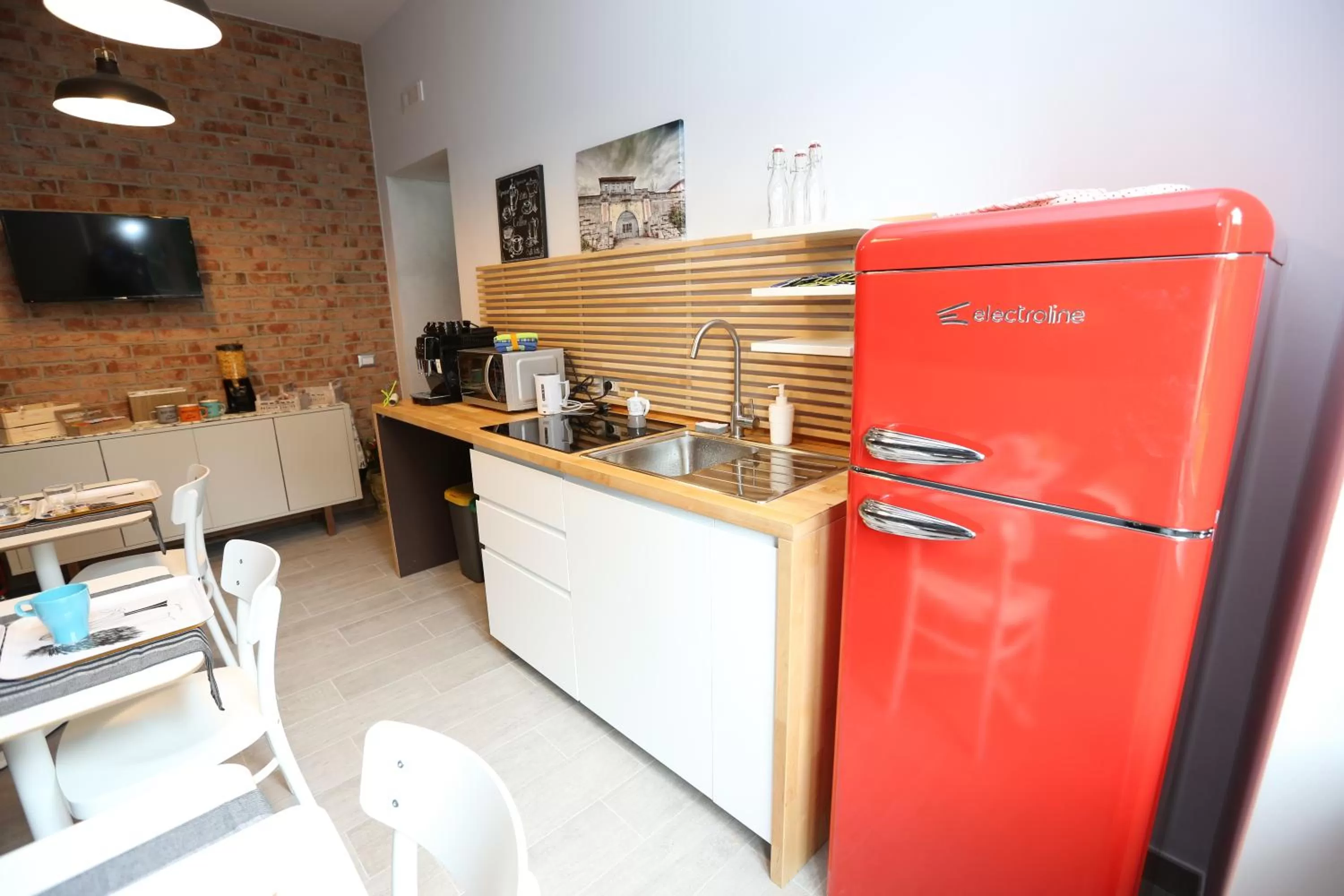 Communal lounge/ TV room in Il Covo degli Arditi B&B