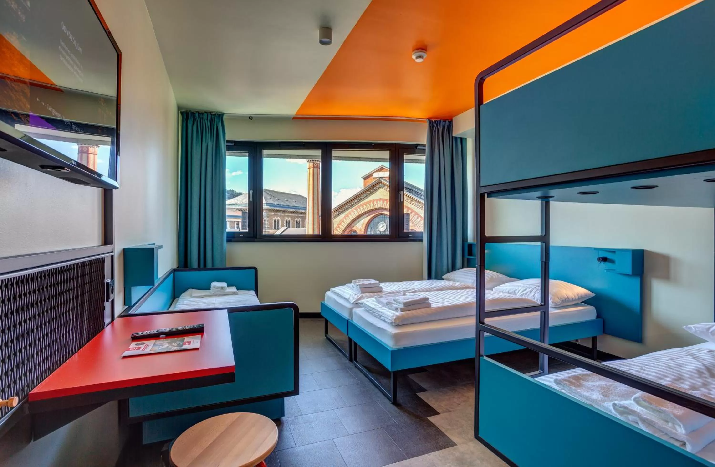 Photo of the whole room, Bed in MEININGER Budapest Great Market Hall