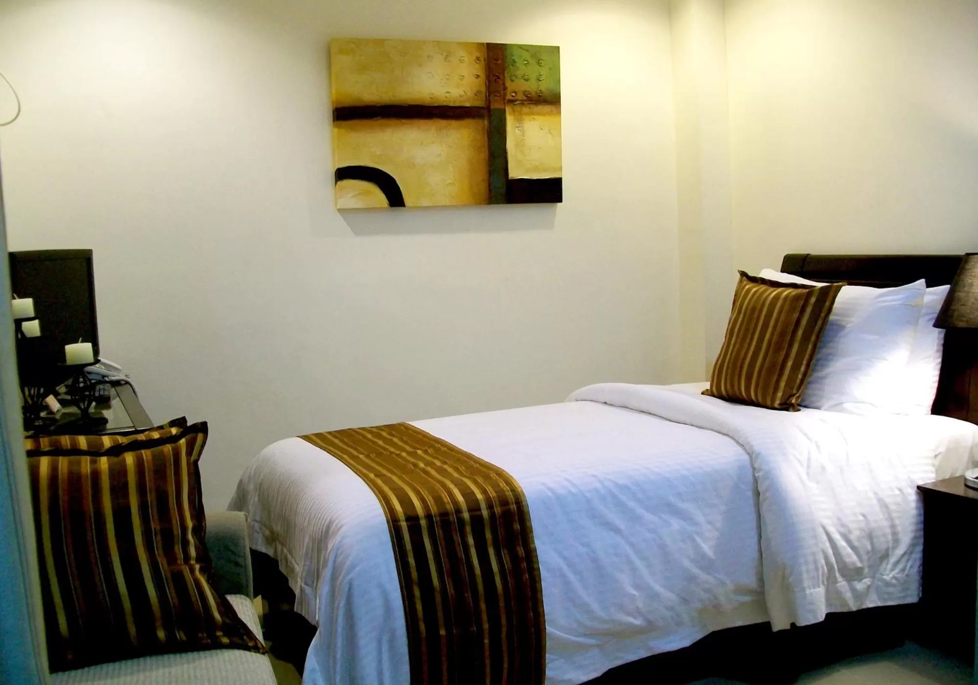 Photo of the whole room, Bed in The Suites at Calle Nueva