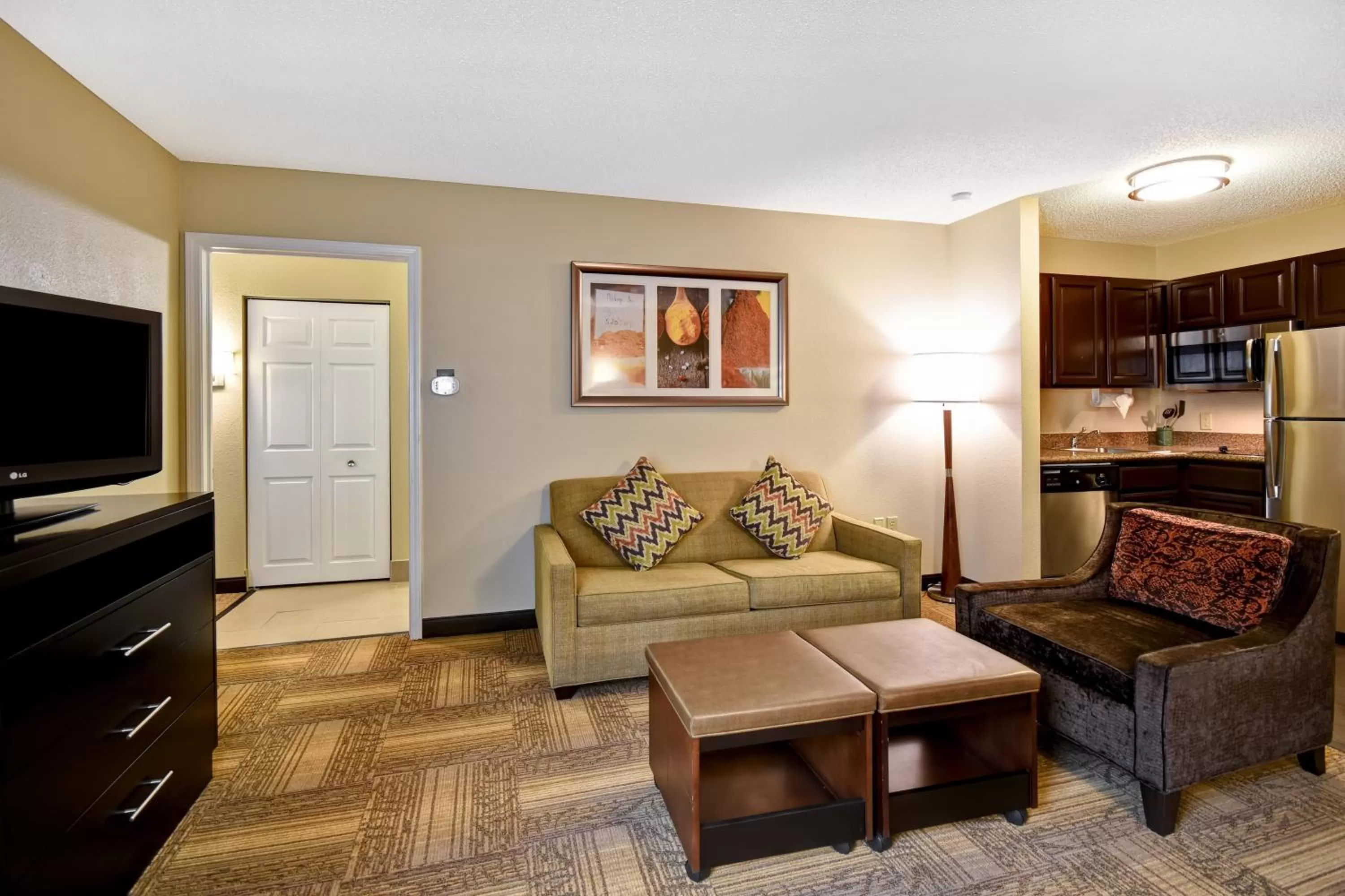 Two-Bedroom Suite with One King and One Queen in Staybridge Suites Grand Rapids-Kentwood, an IHG Hotel