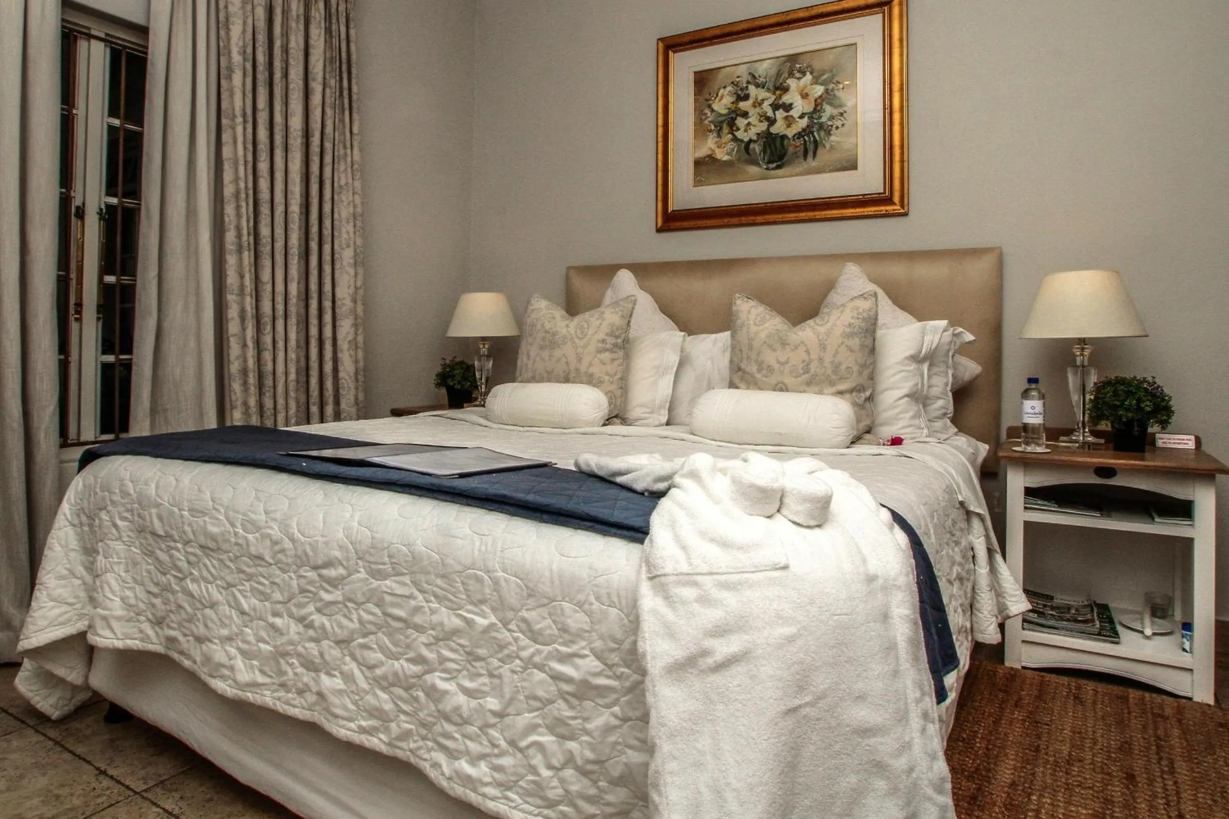 Bed in Sandals Guest House