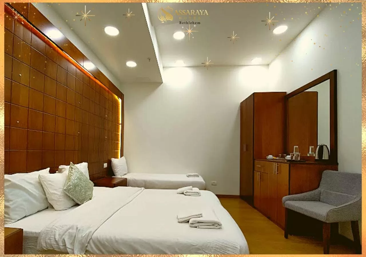 Bed in Assaraya Palace Hotel