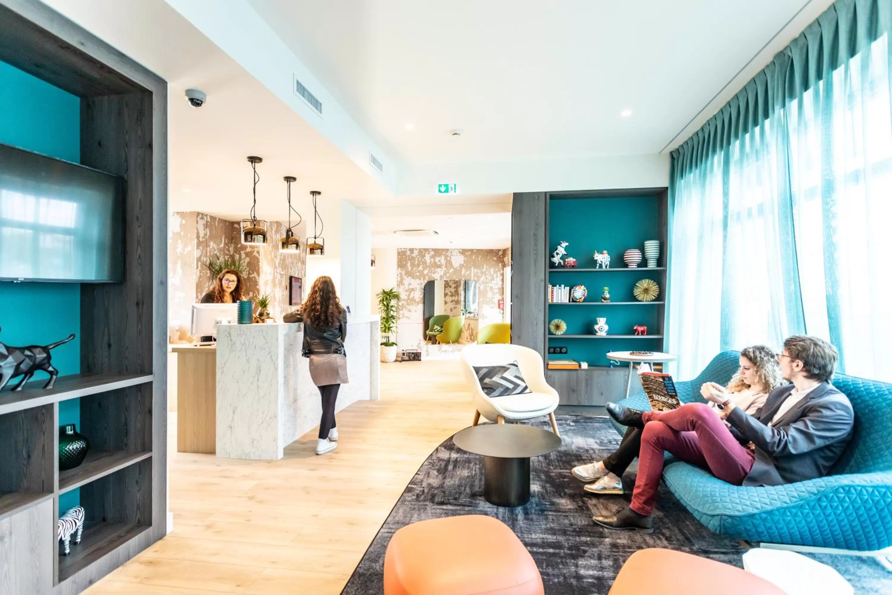 People in Hôtel The Originals City Le Berry - proche centre-ville - Gare - parking - recharge véhicule