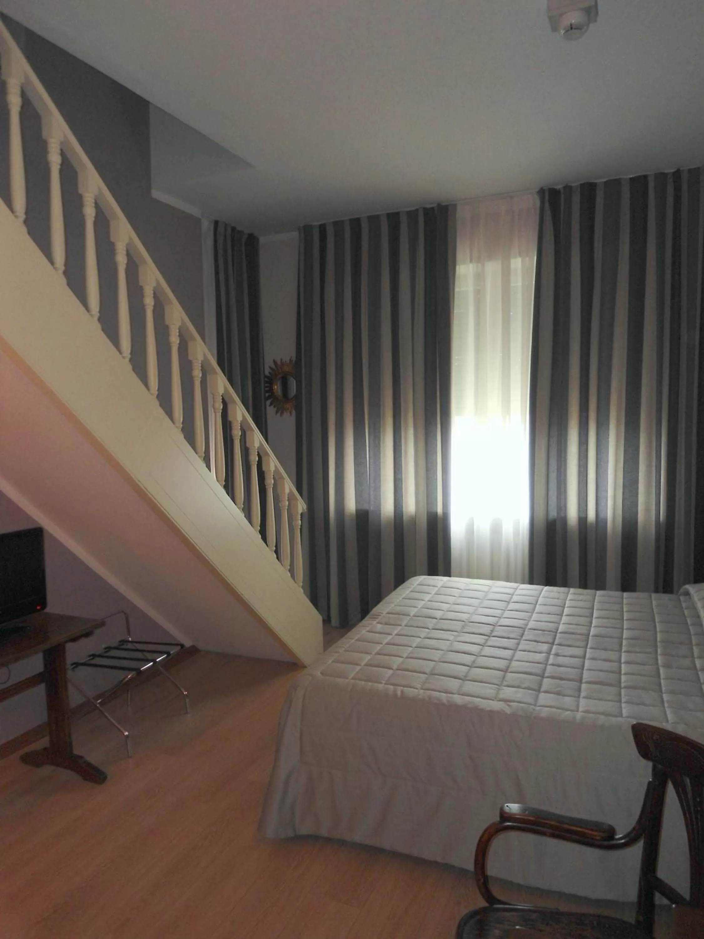 Bed in Hotel Continental