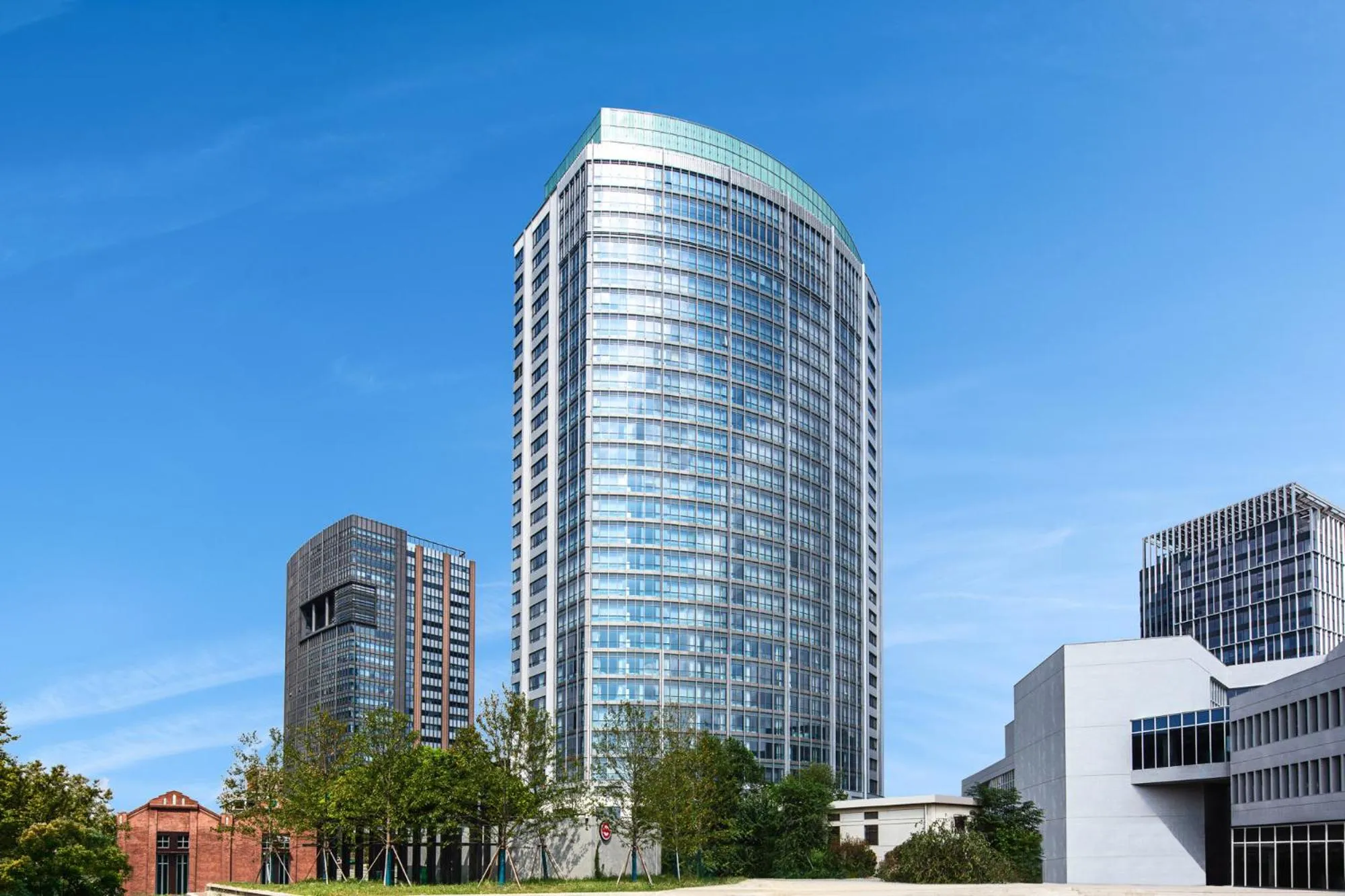 Property building in HUALUXE Shanghai Changfeng Park by IHG