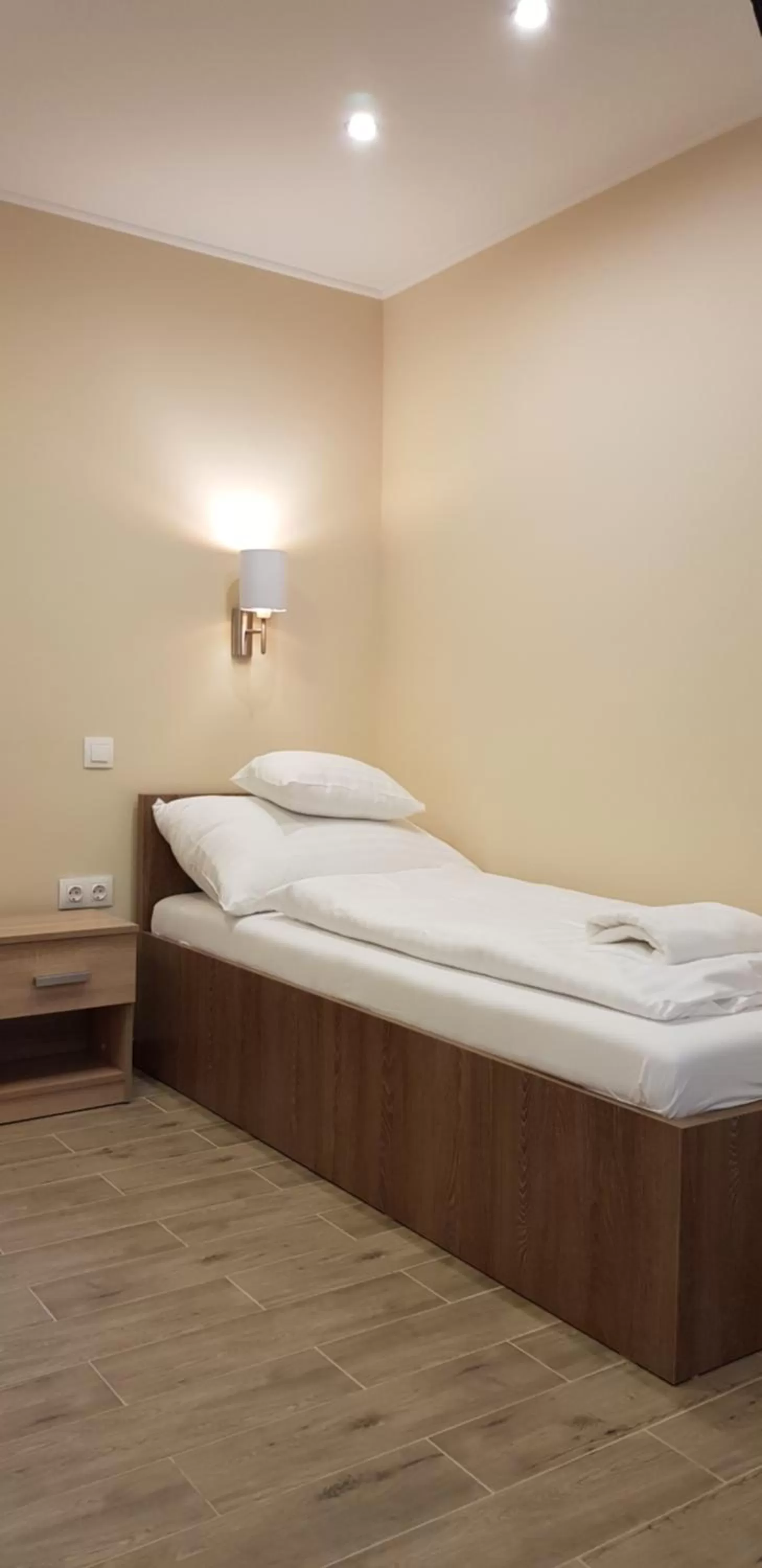 Bed in Central Panzió Gyula