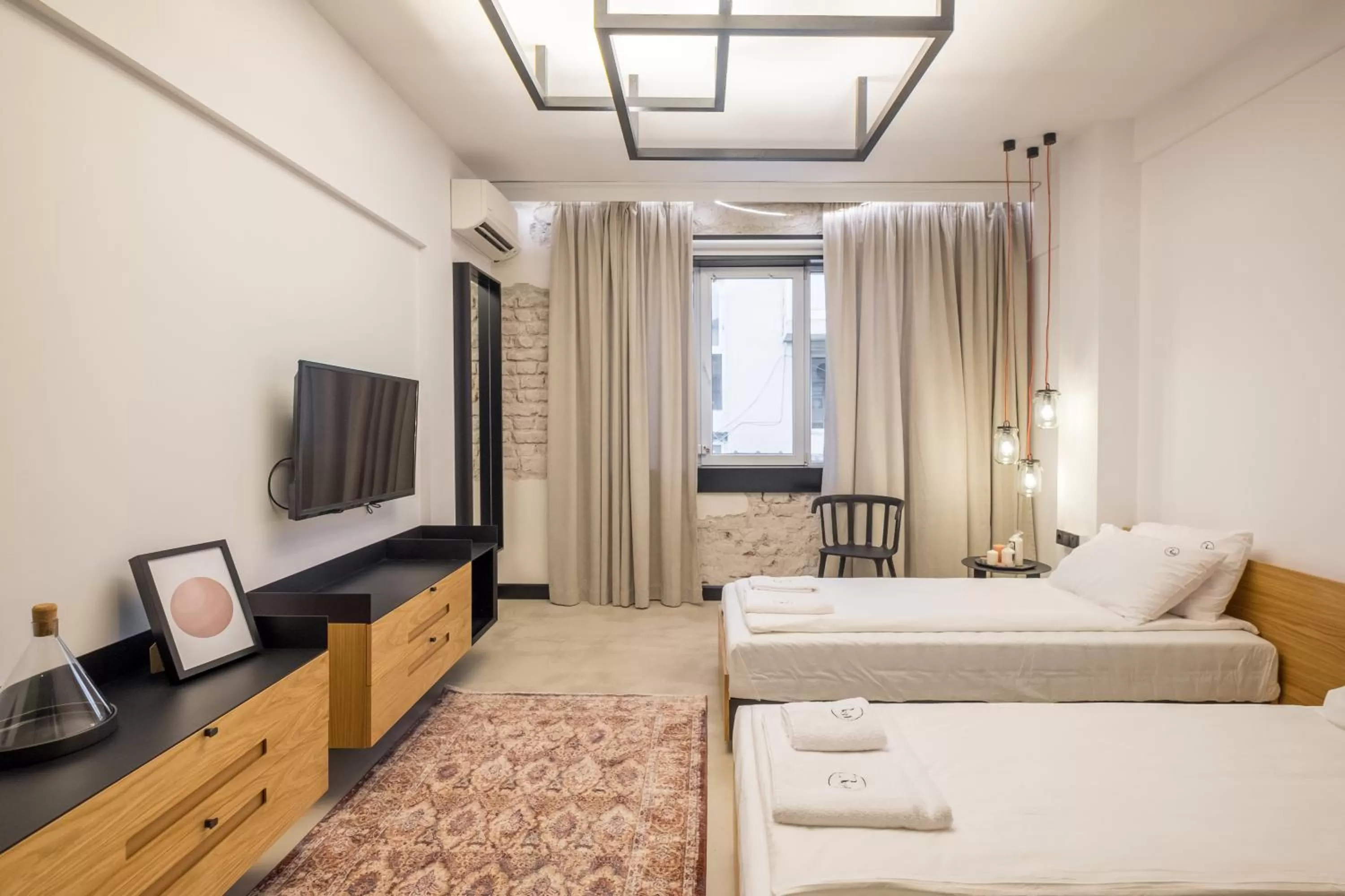 Bed in R34 Boutique Hotel