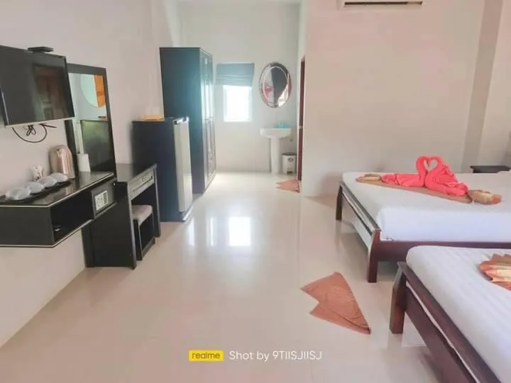 Bed in Tamarind Twin Resort