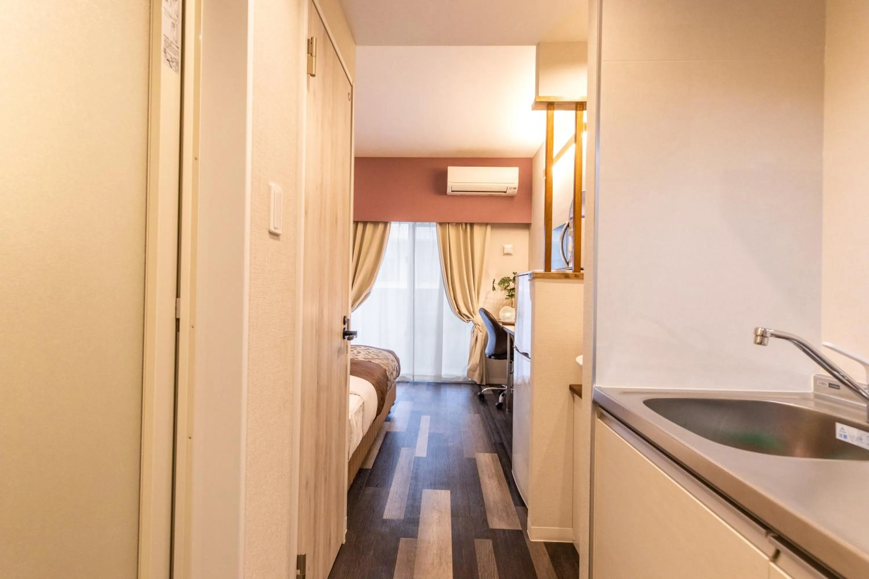 Photo of the whole room, Kitchen/Kitchenette in MrKINJO in Nicas Makishi