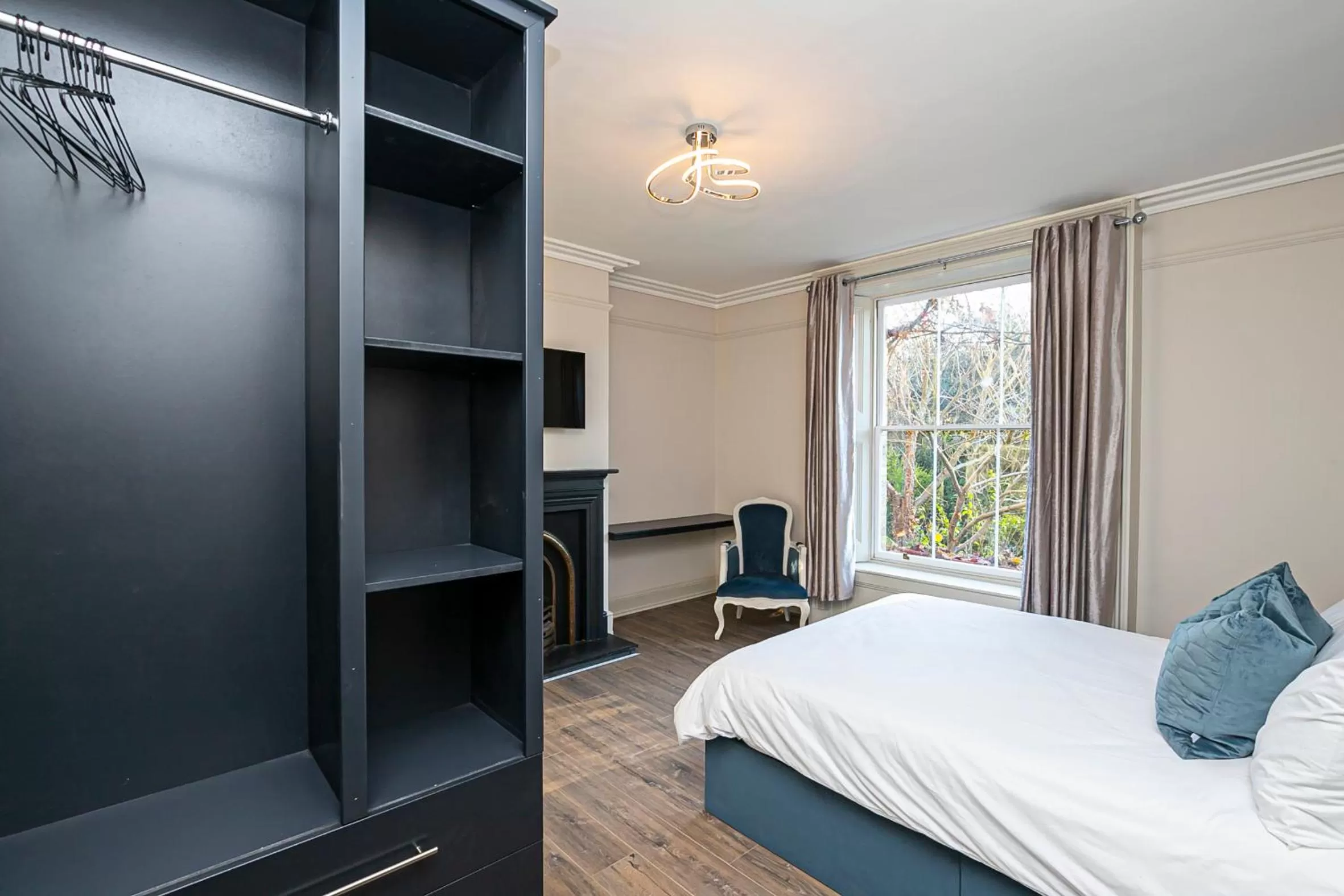 Bed in Pages Hotel and Guesthouse