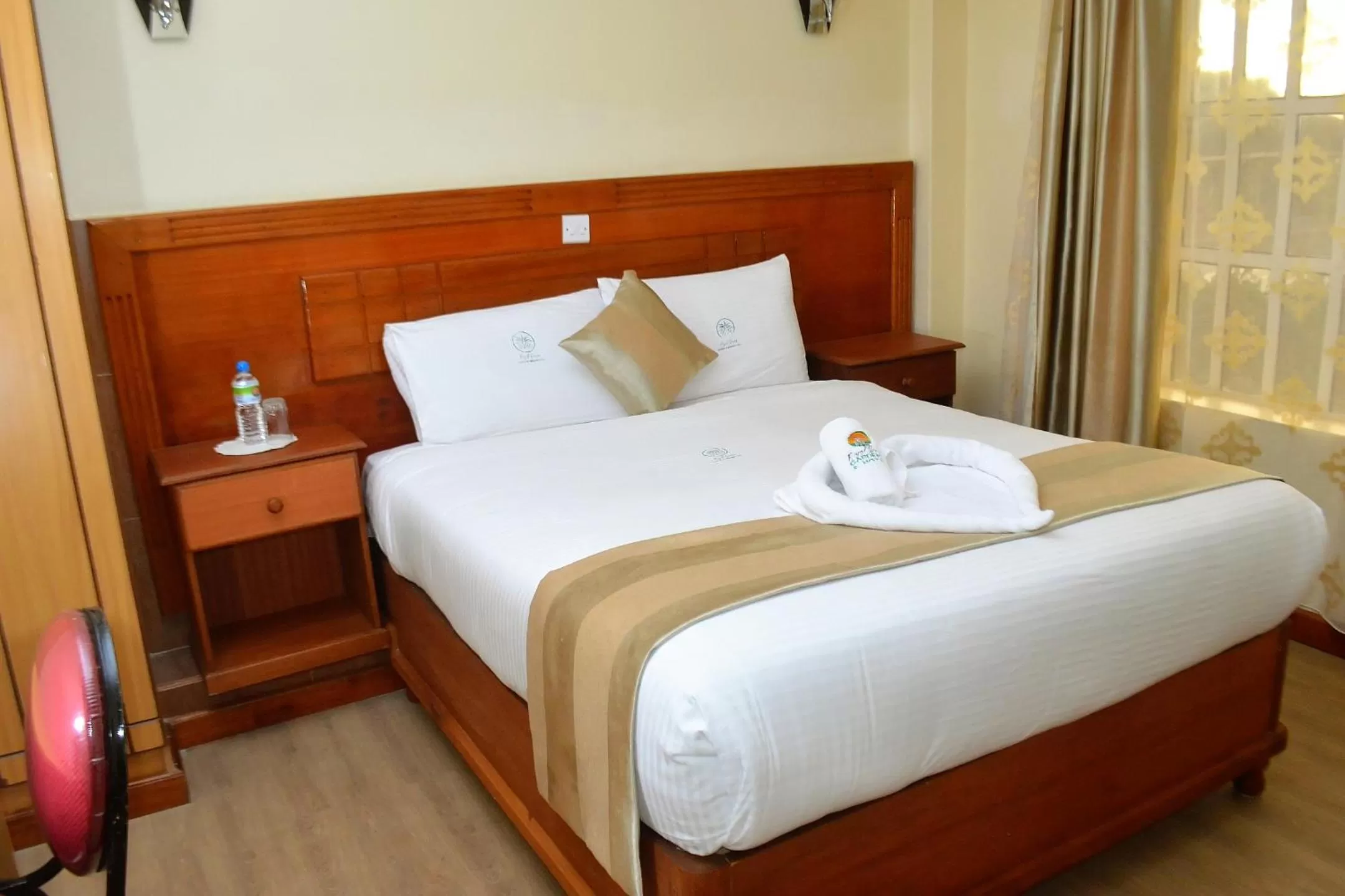 Bed in Royal Green Gardens Resort