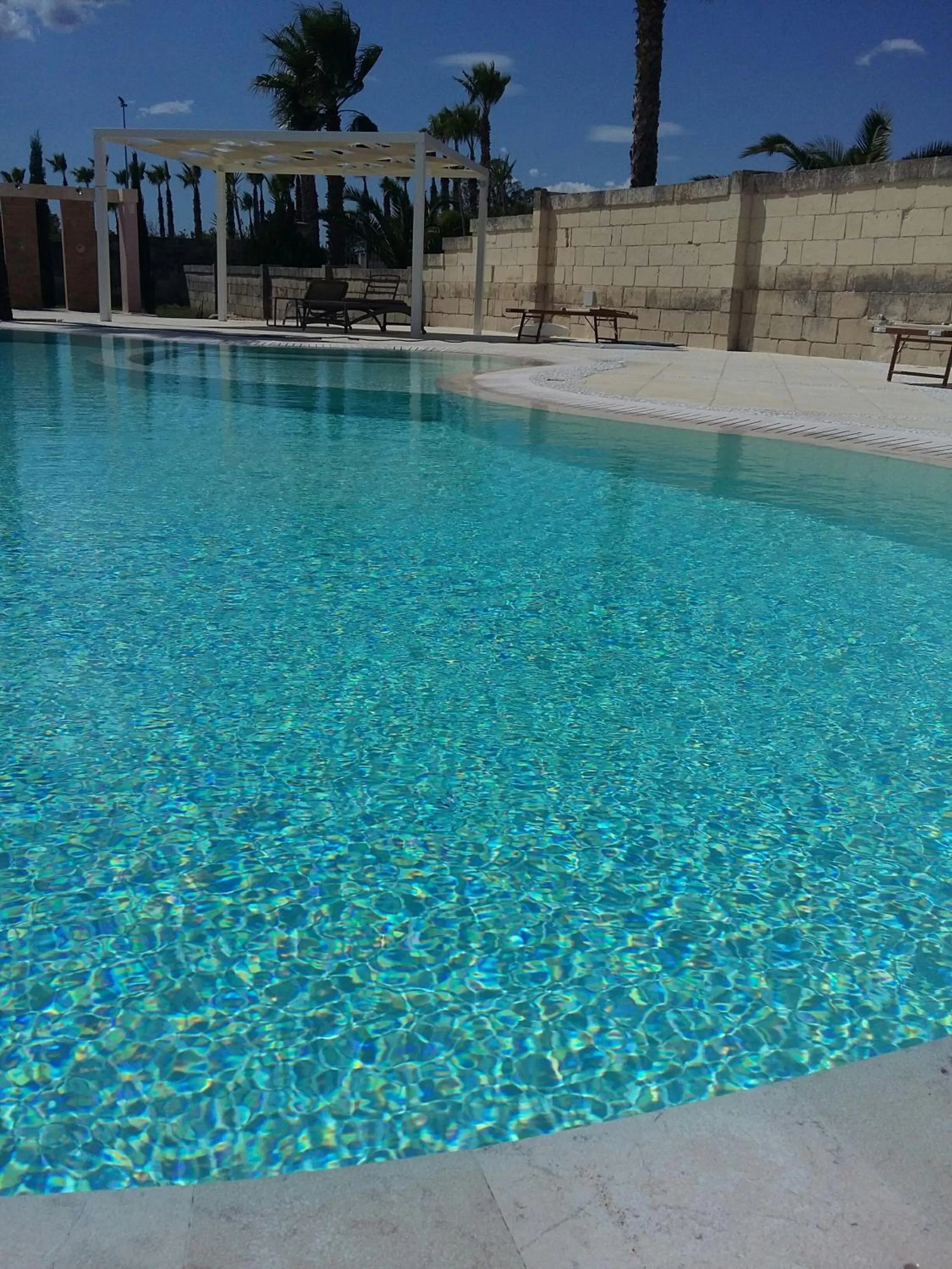 Swimming pool in La Suite Negli Orti