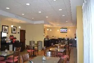 Queen Room with Two Queen Beds, Mobility Access and Roll-In Shower, Non-Smoking in Days Inn by Wyndham Laurel MS Queen Room with Two Queen Beds, Mobility Access and Roll-In Shower, Non-Smoking in Days Inn by Wyndham Laurel MS