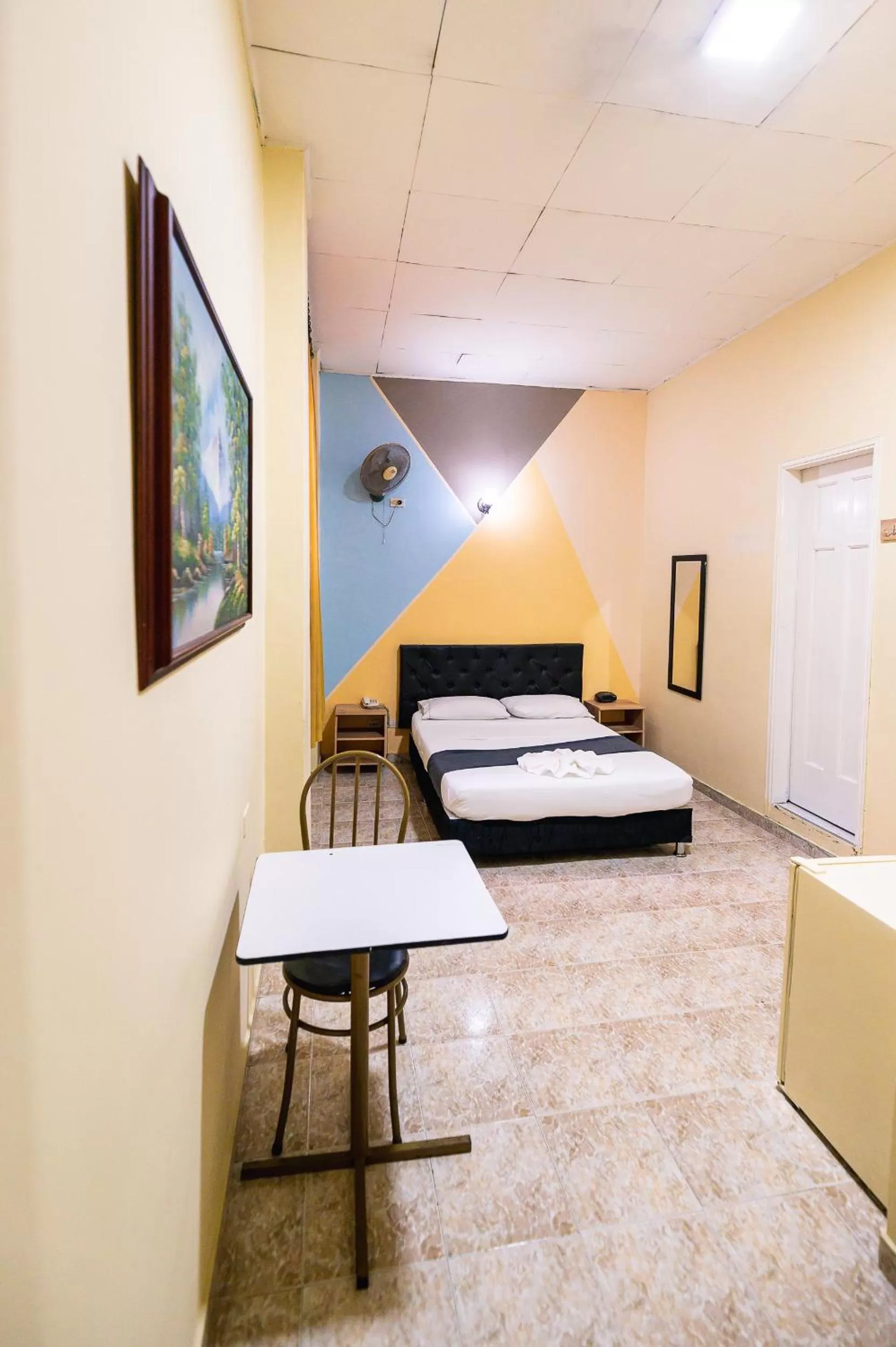 Bed in HOTEL CALLE REAL SUITE