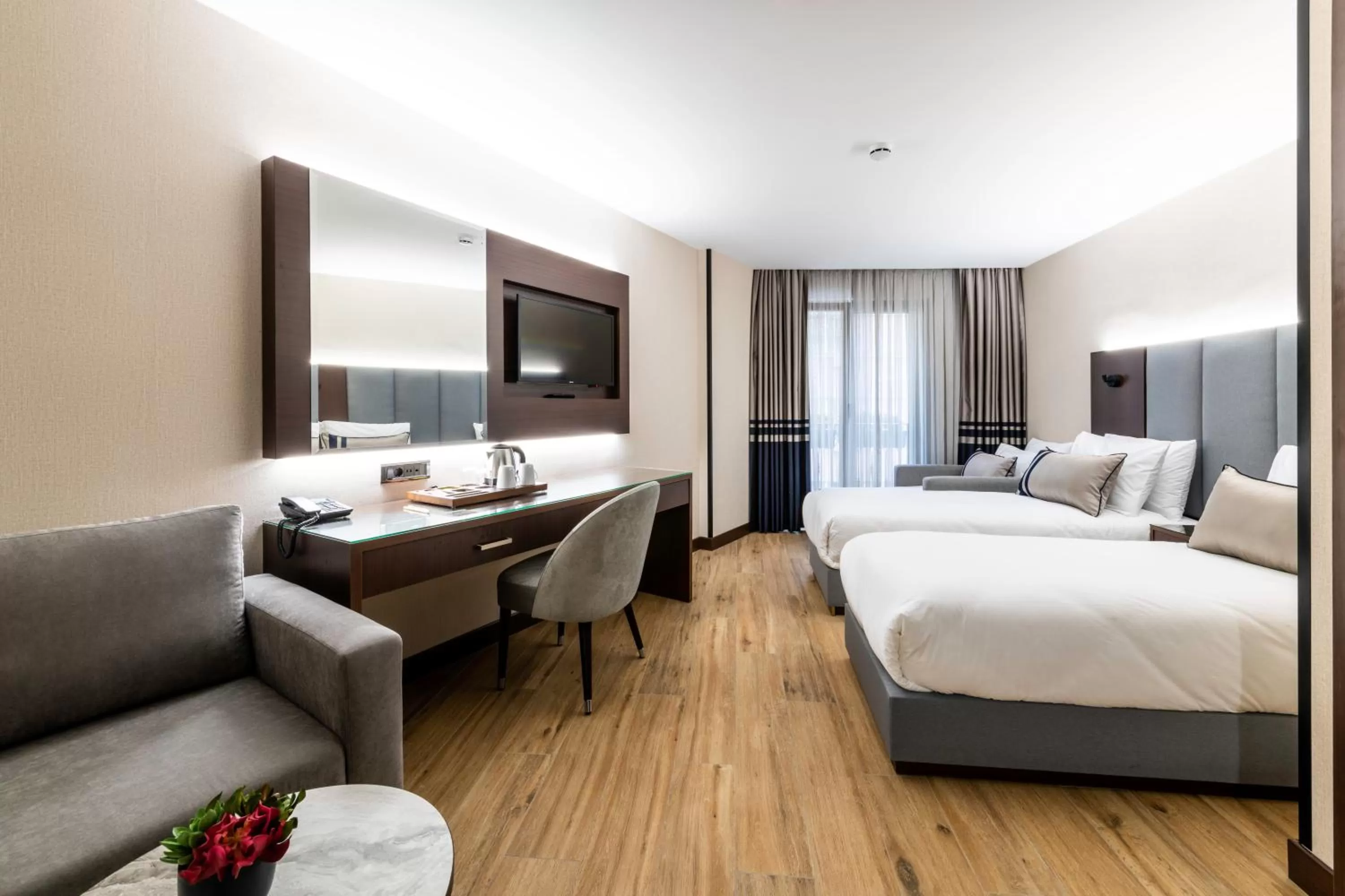 Bed in Aprilis Deluxe Hotel