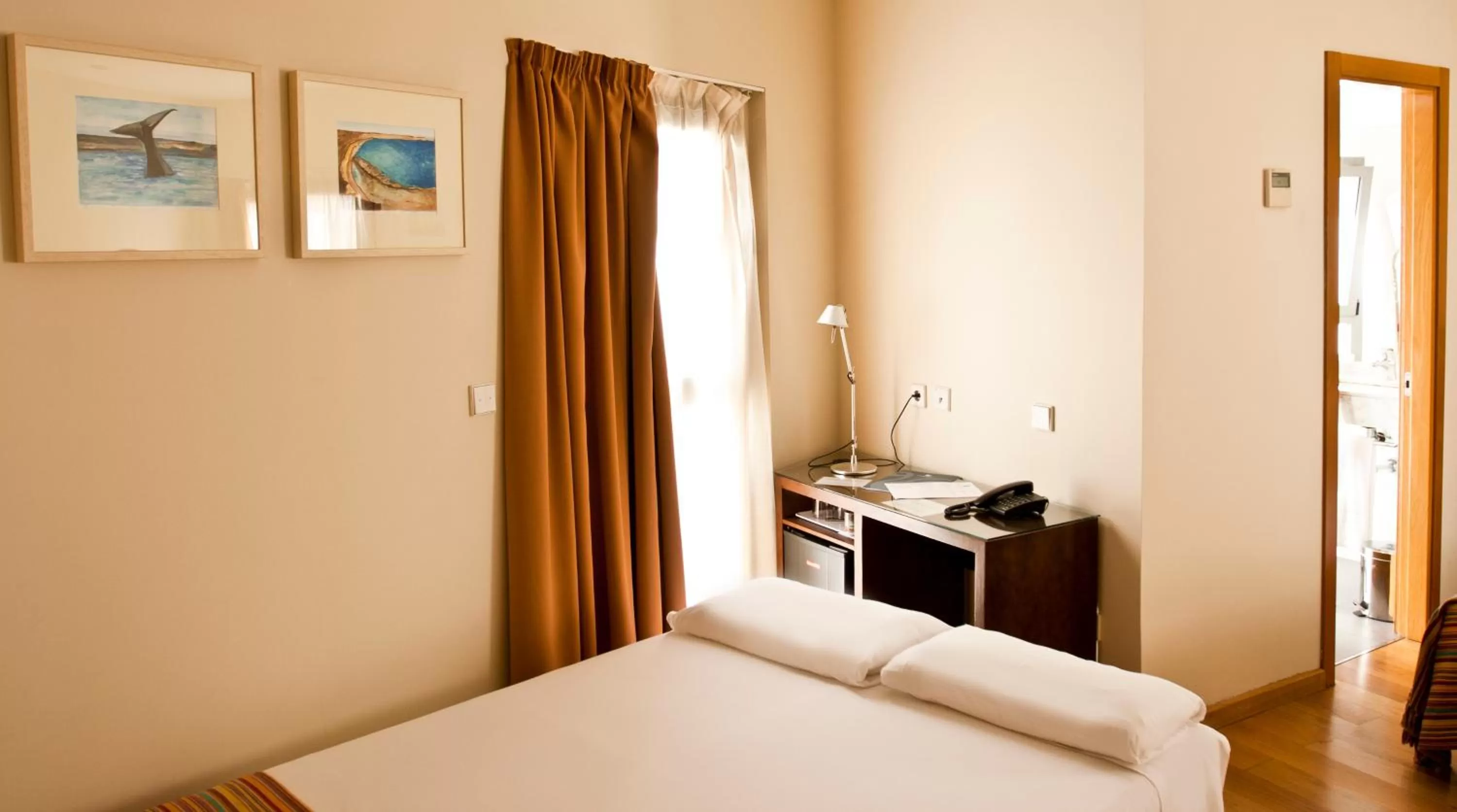 Bed in Hotel Apartamentos Patagonia Sur