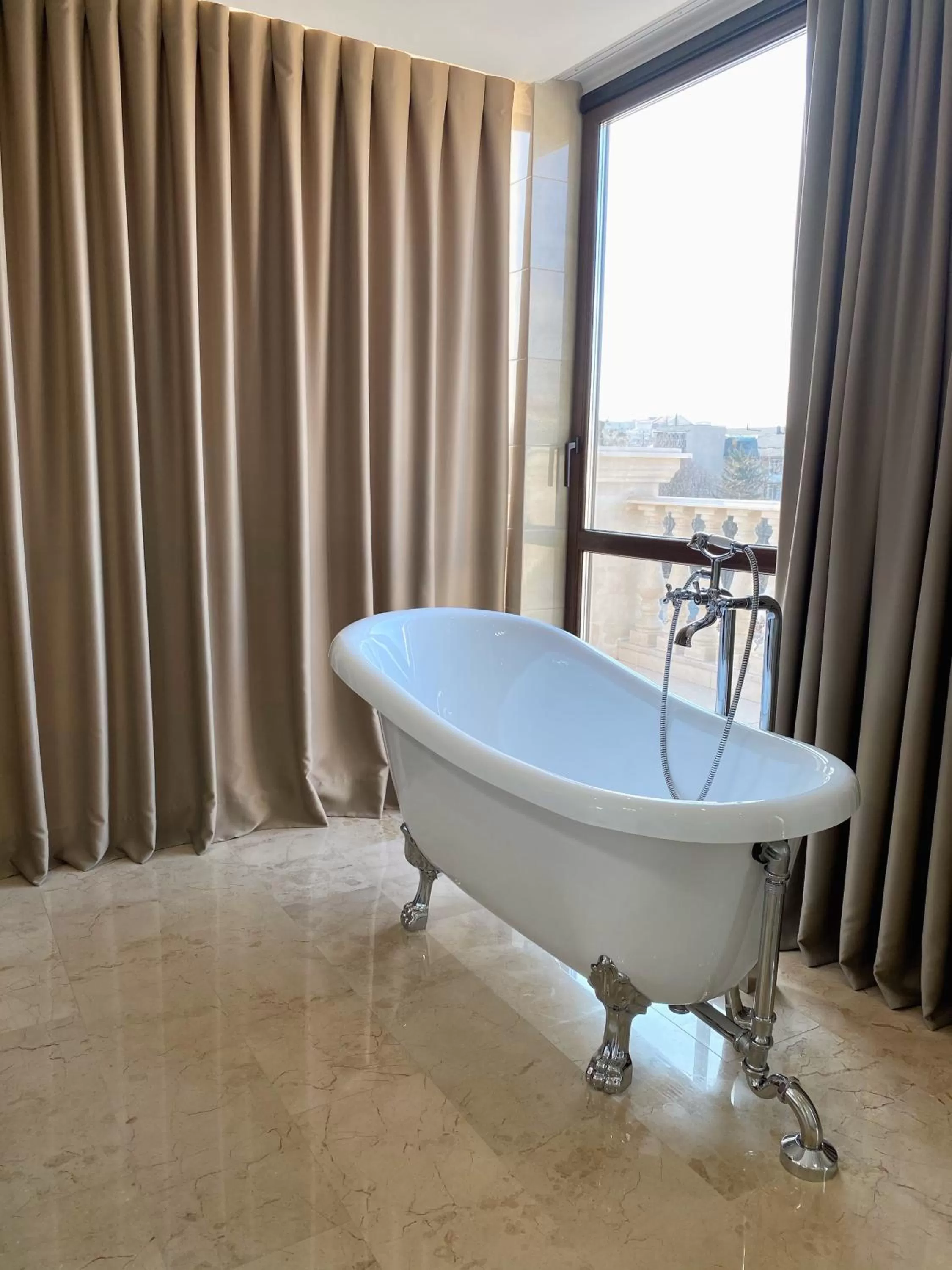 Bath in Ambassador Hotel