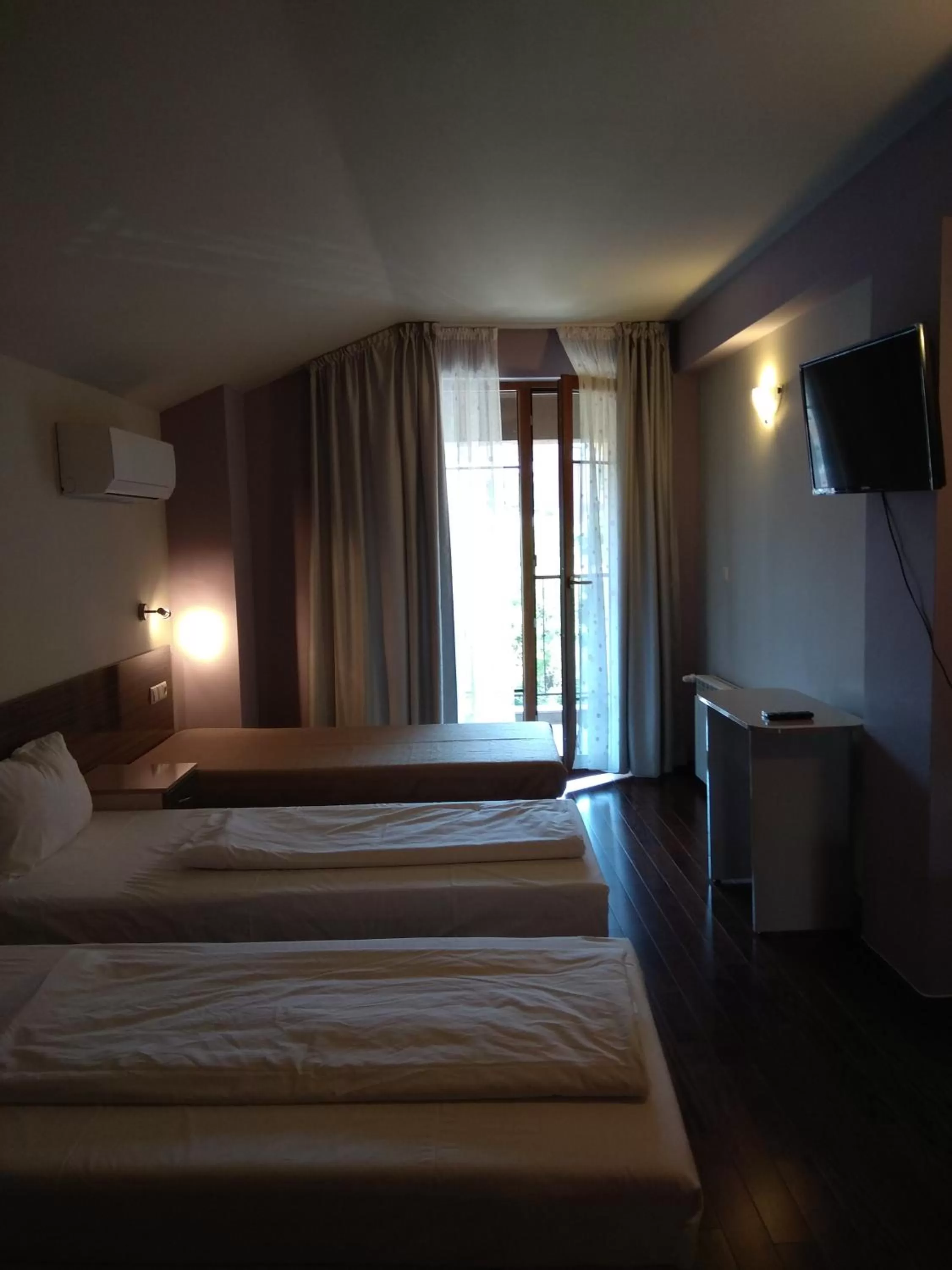 Bed in Roots Hotel and Wine Bar