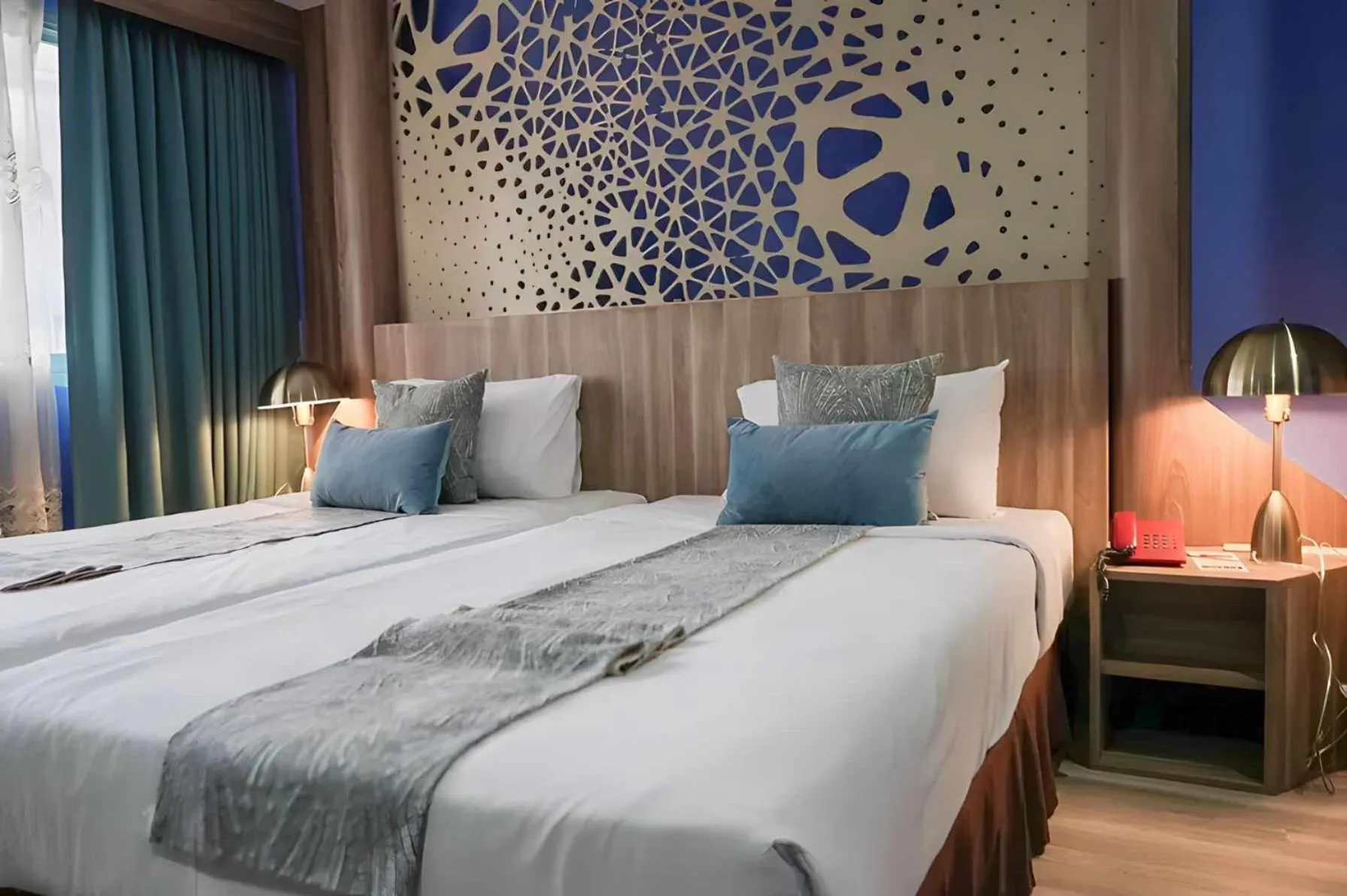 Bed in Grand Lucky Hotel