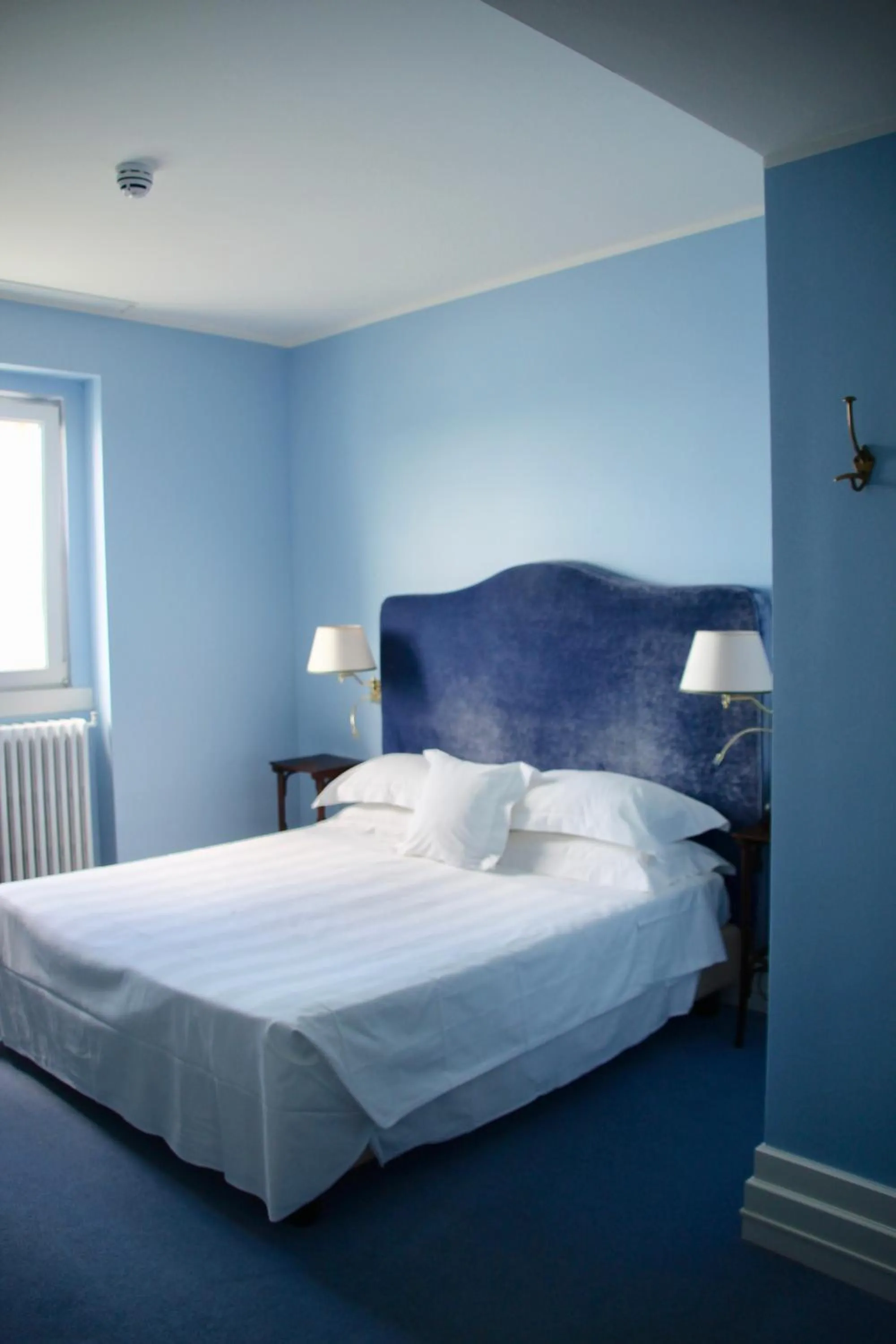 Bed in Hotel Riviera & Maximilian's