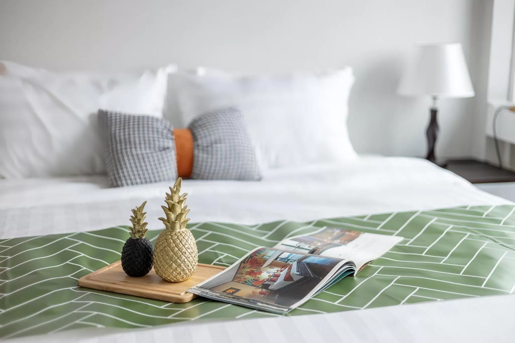 Bed in Ivy Hotel & Apartment