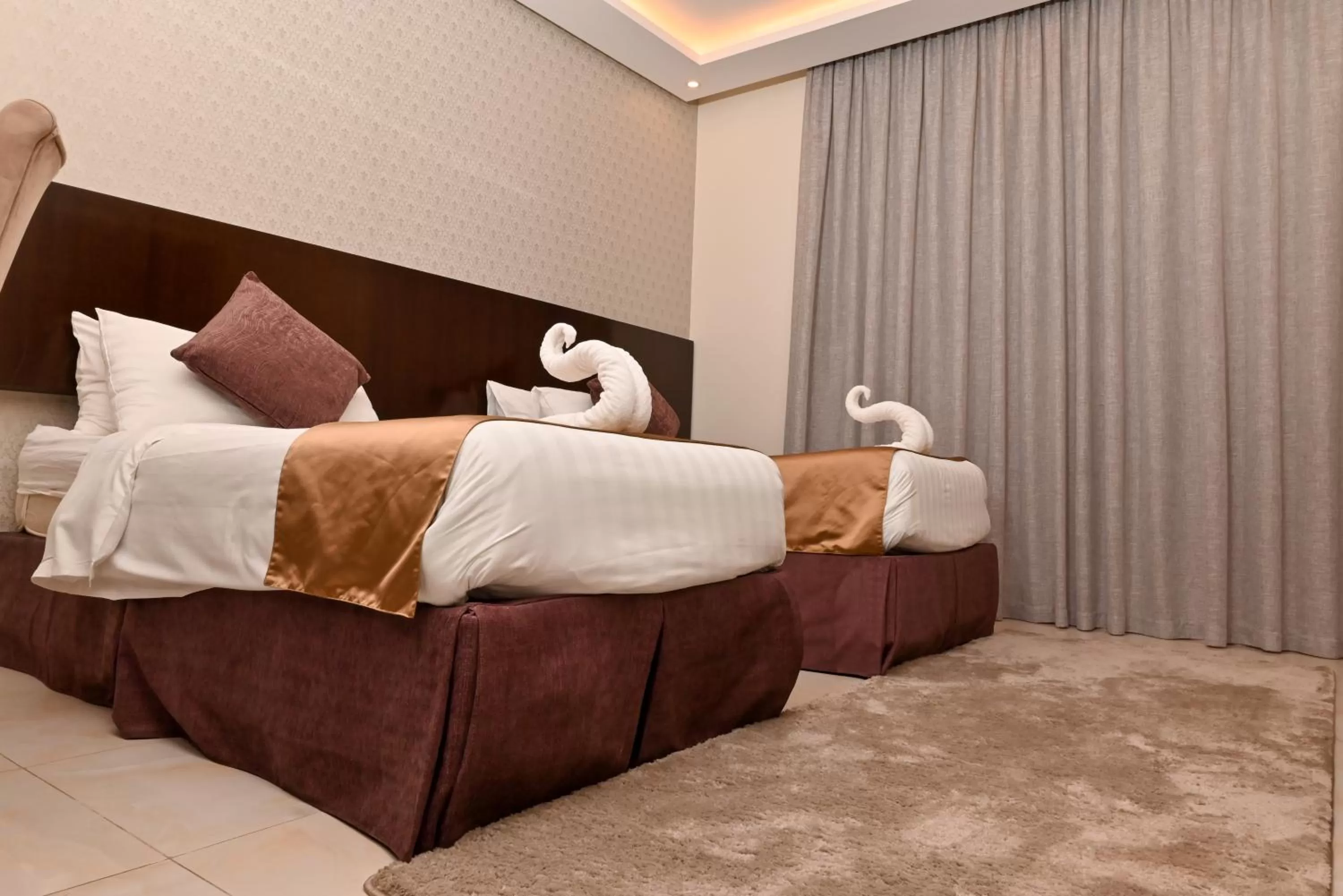 Bed in The Artisan Hotel-Suits