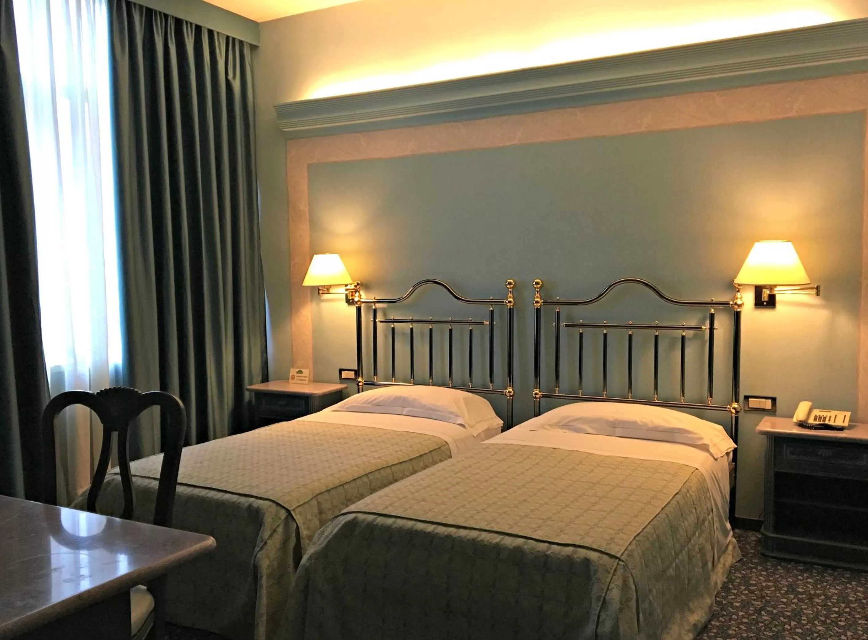 Photo of the whole room, Bed in Guglielmotel