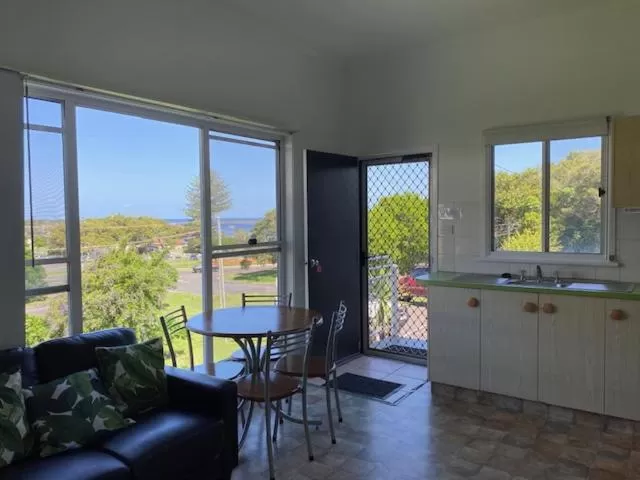Dining area in Leisure-Lee Holiday Apartments