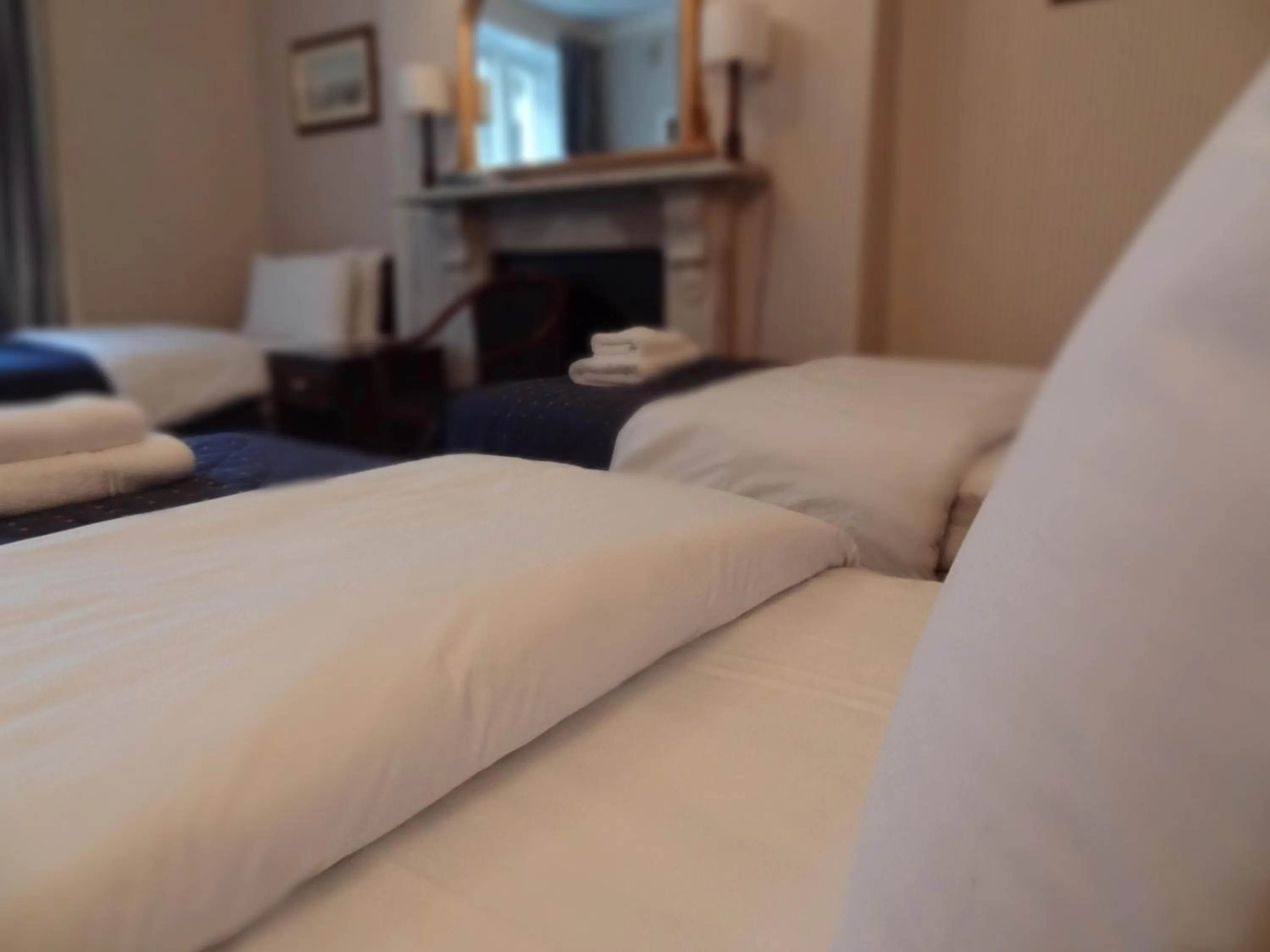 Bed in Regency House Hotel