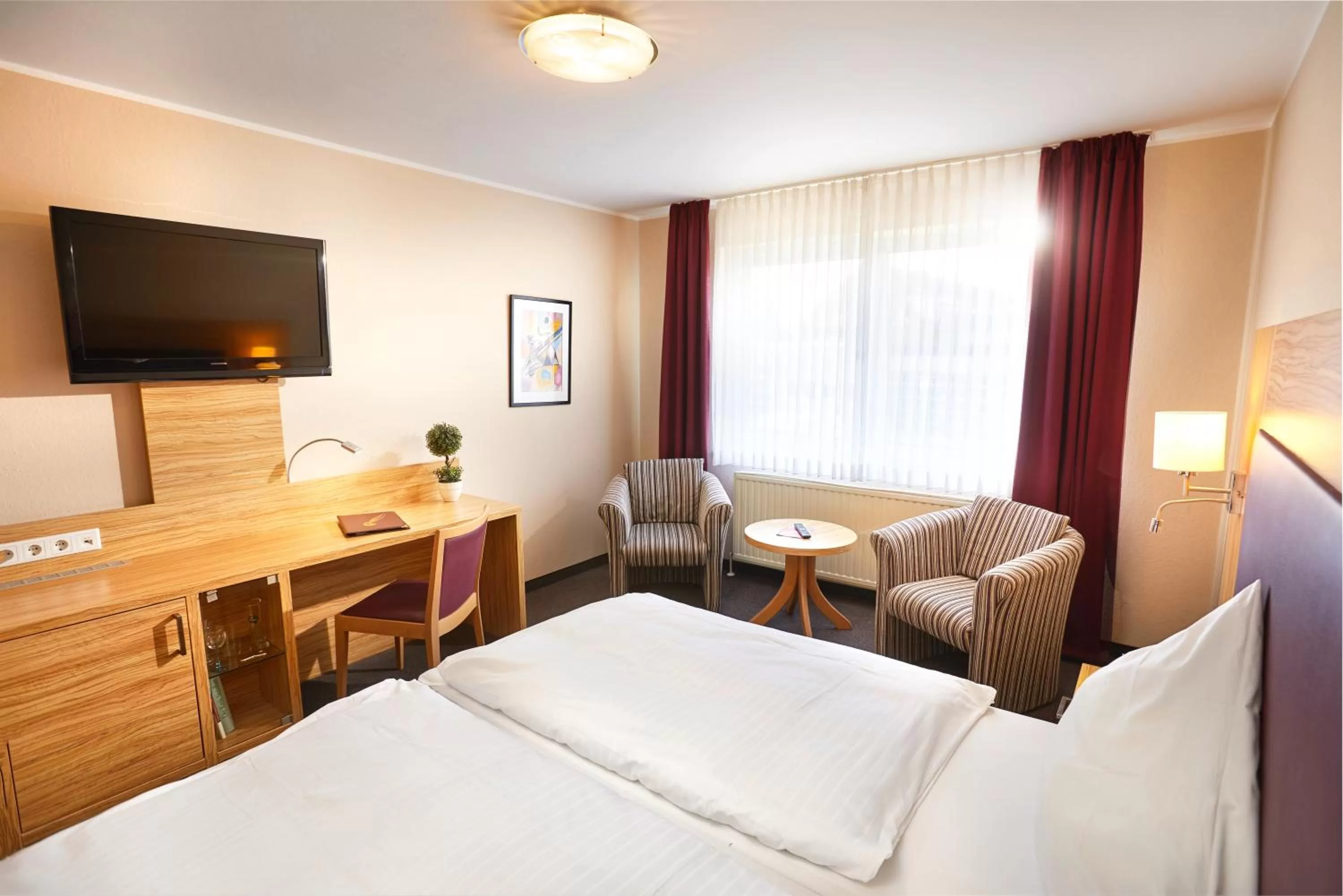 Photo of the whole room, Bed in Hotel Schünemann