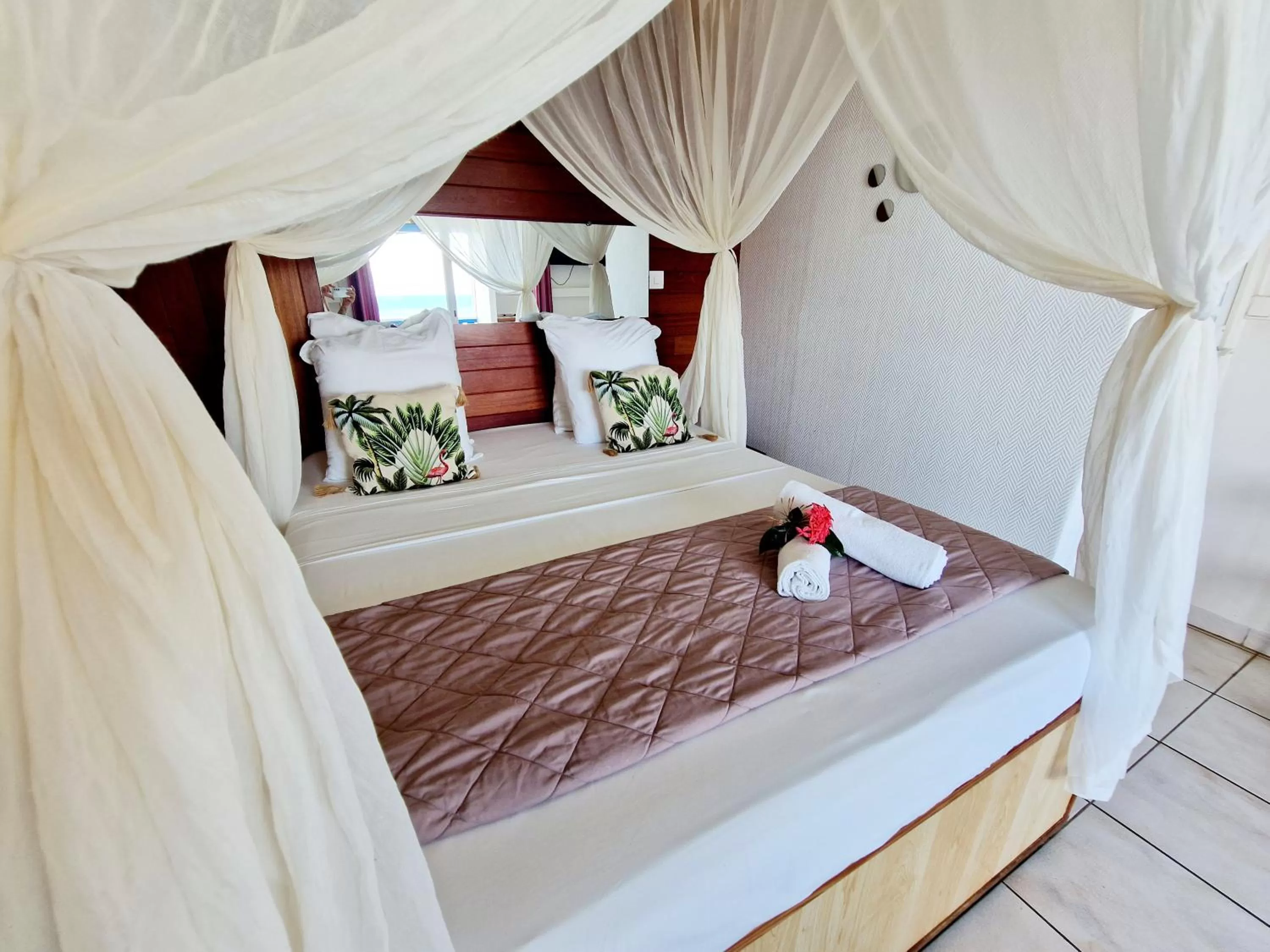 Bed in Hotel Le Manguier