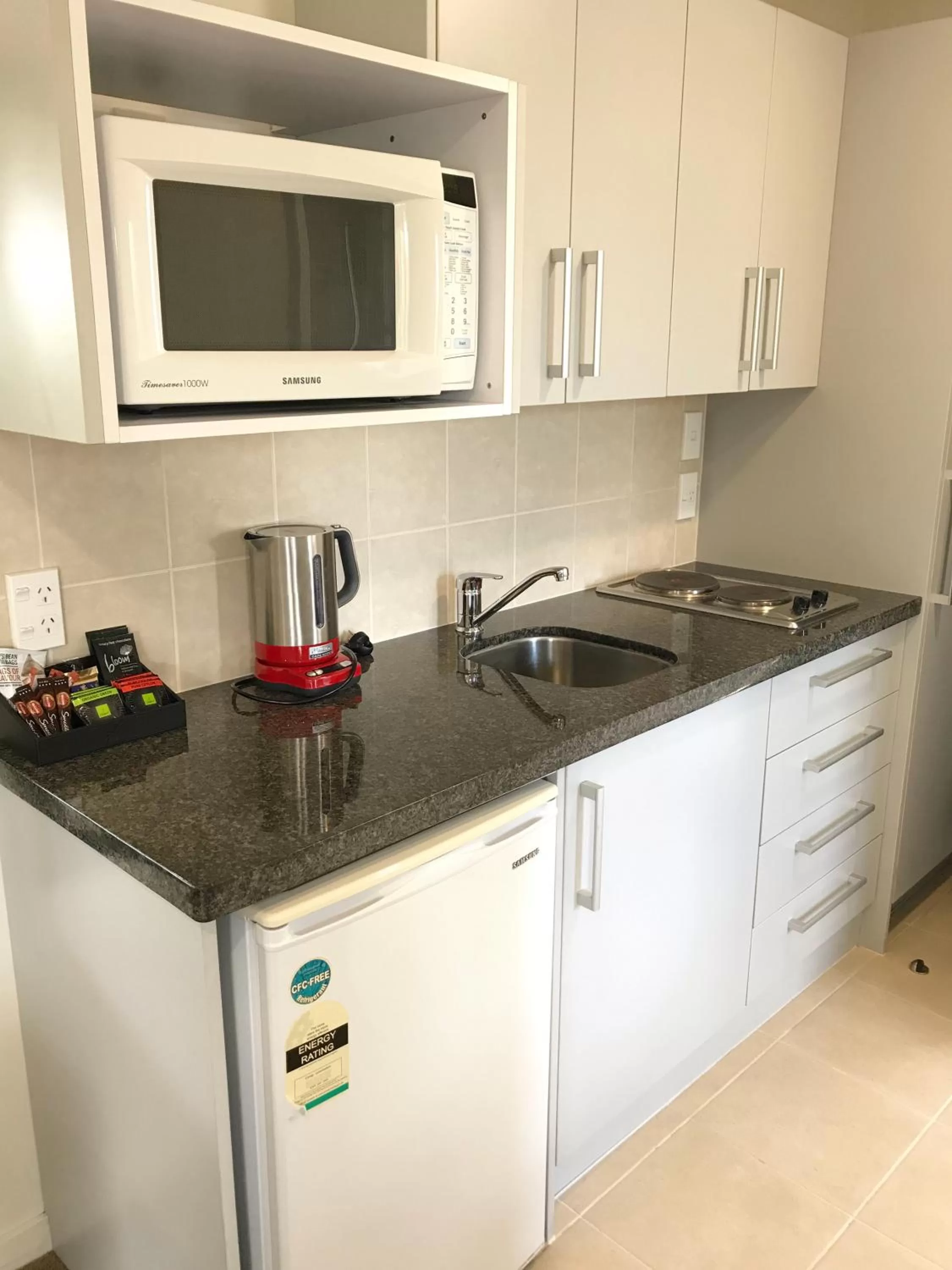 Kitchen or kitchenette in Alpha Motel with Spa-Bath