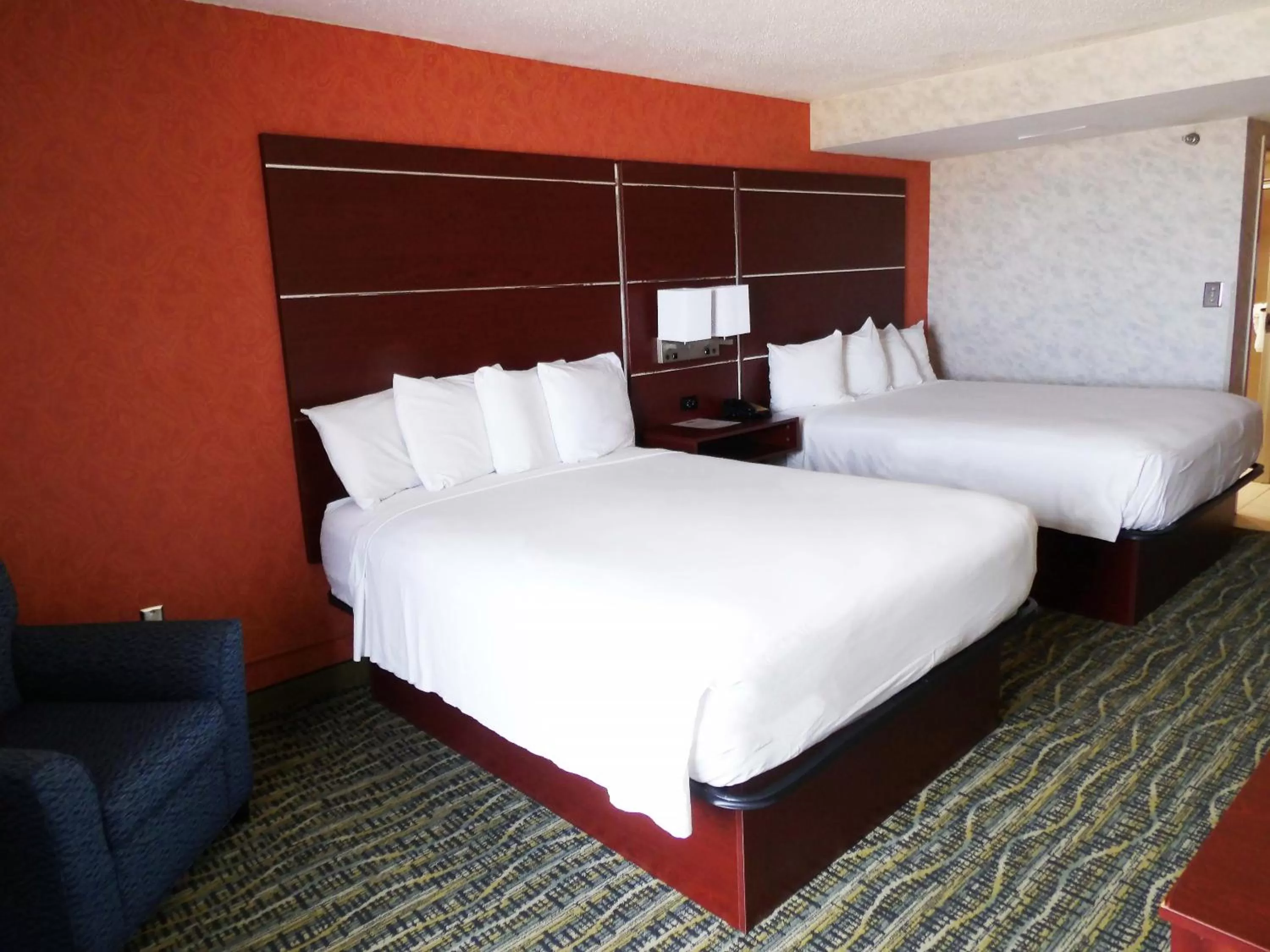 Bed in The Breakers Resort Inn