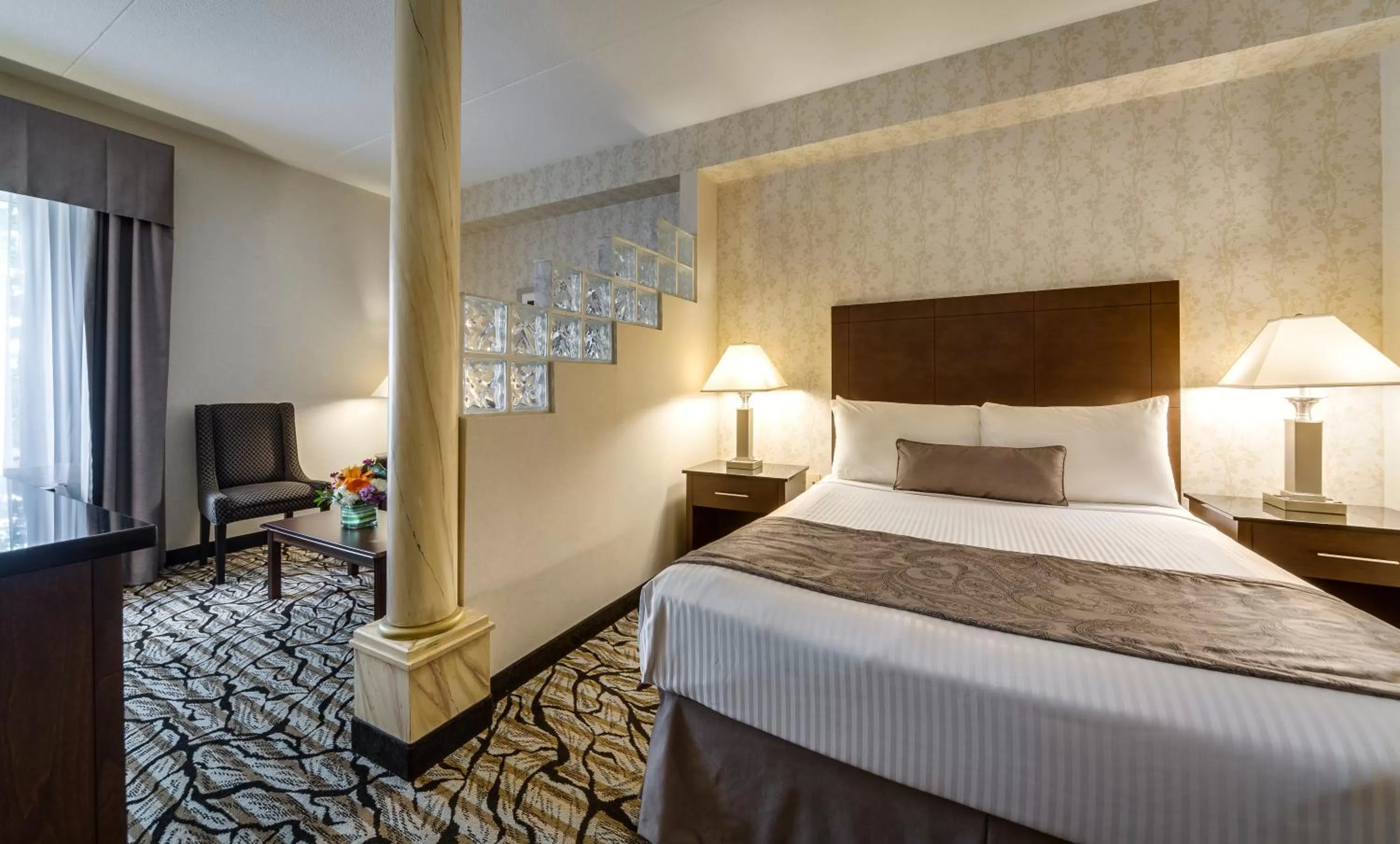 Photo of the whole room, Bed in Monte Carlo Inn Oakville Suites