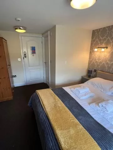 Bed in Manor House Hotel and Restaurant