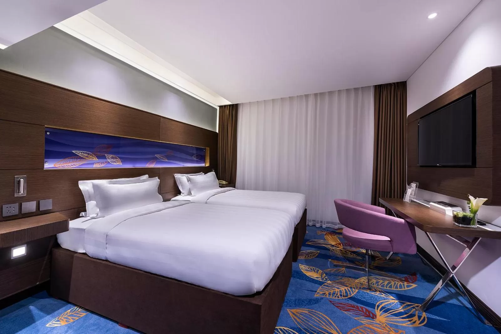 Communal lounge/ TV room, Bed in Novotel Beijing Peace