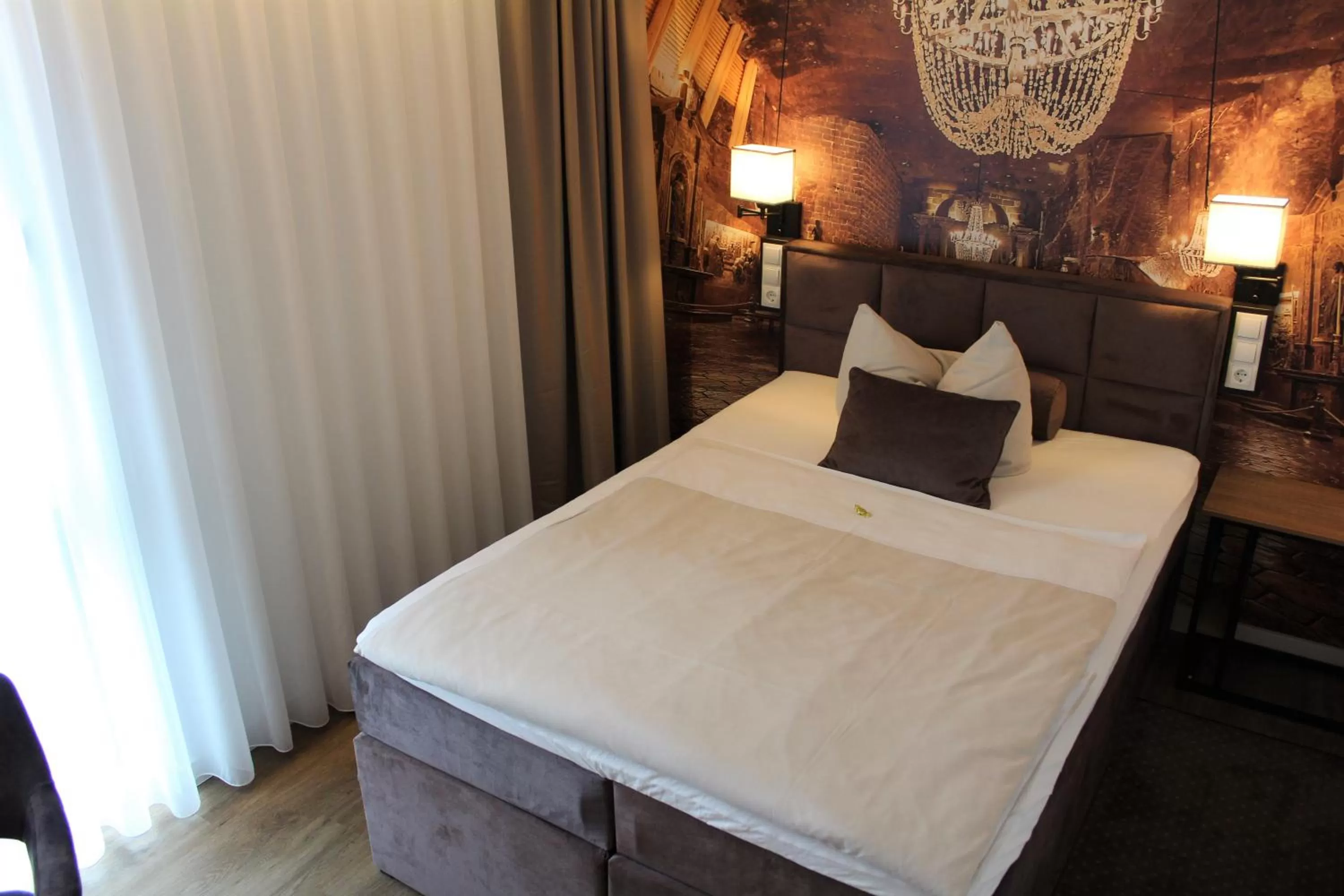 Bed in Hotel Ammerländer Hof