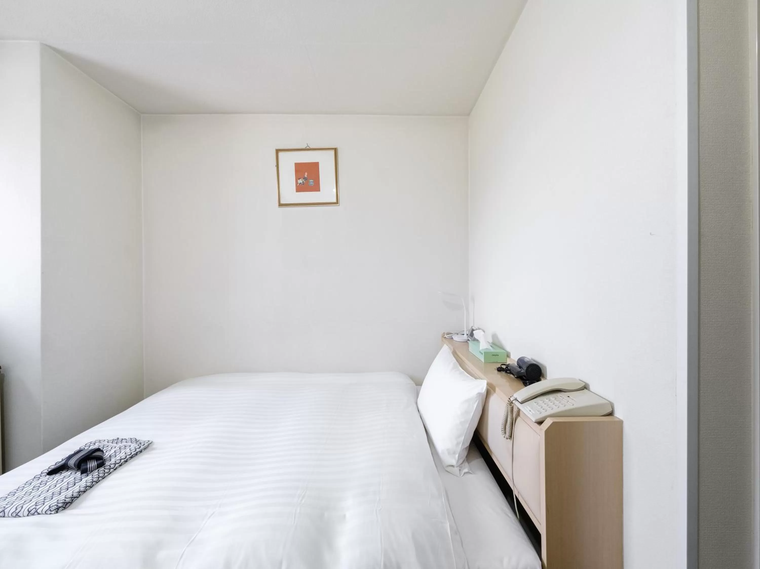 Bed in Tabist THE GREEN ASAHIKAWA