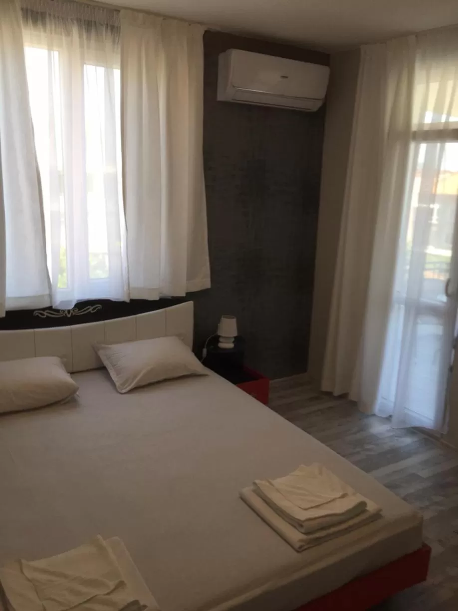 Bed in Family Hotel Malibu