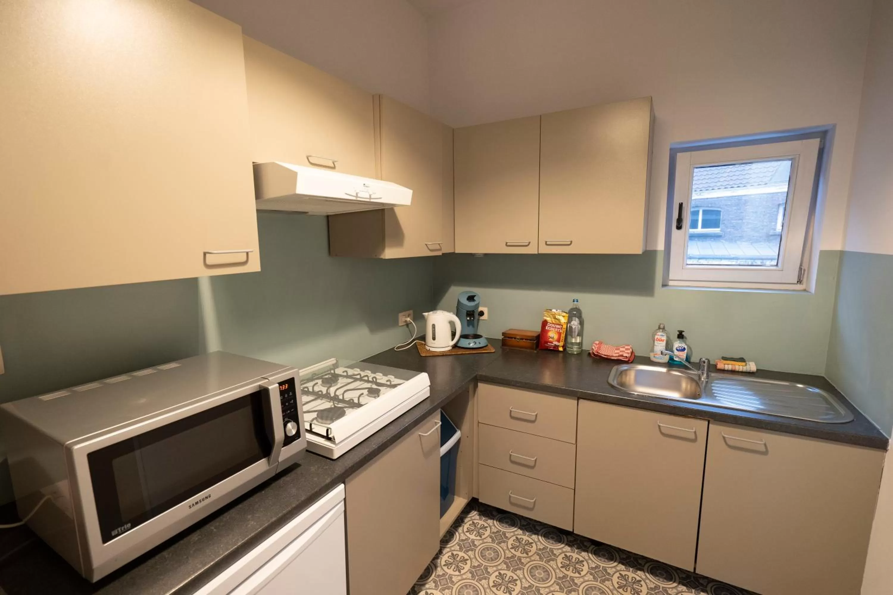 Kitchen or kitchenette in Because the Night city lodge