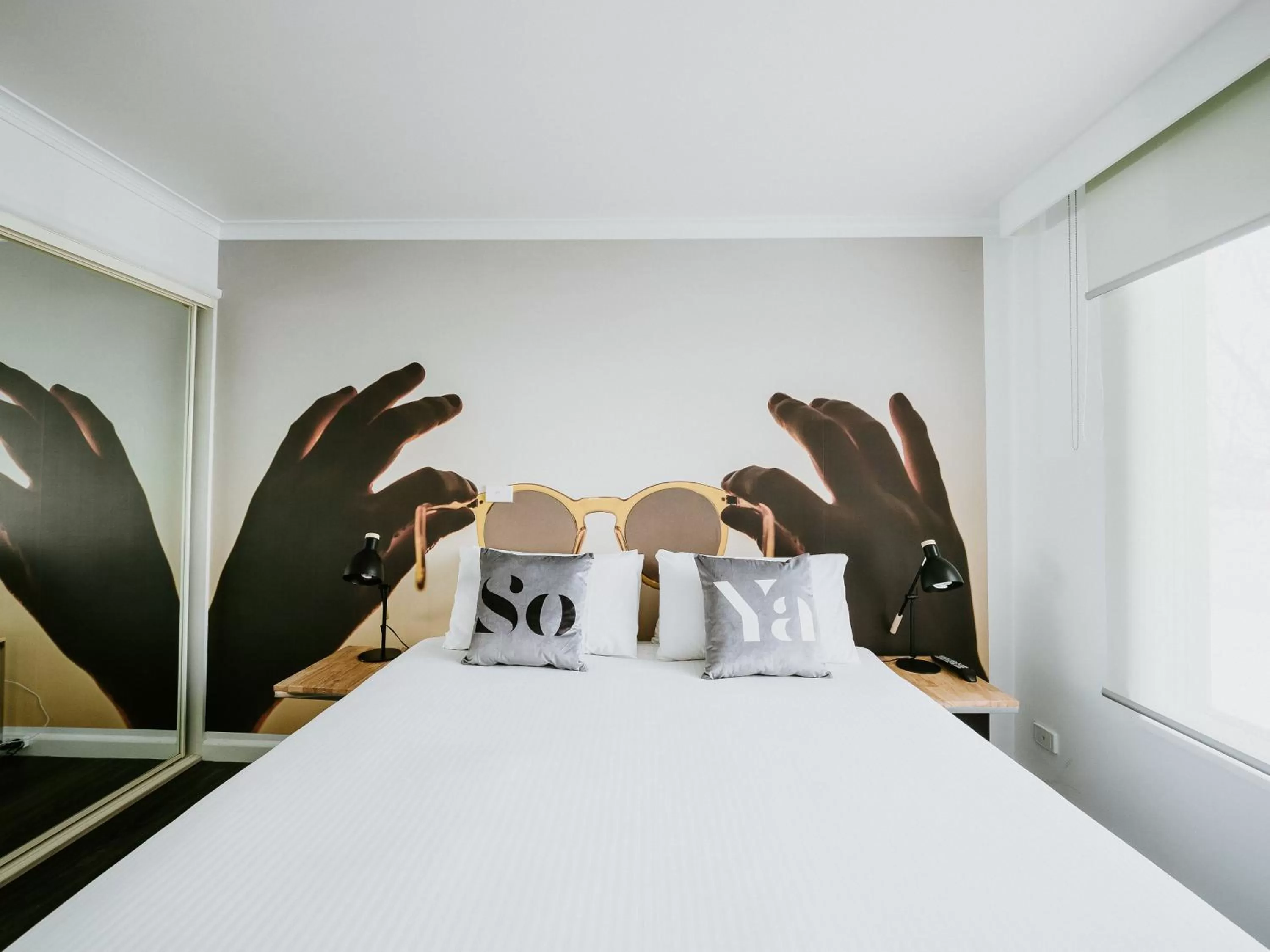 Bed in SoYa Apartment Hotel